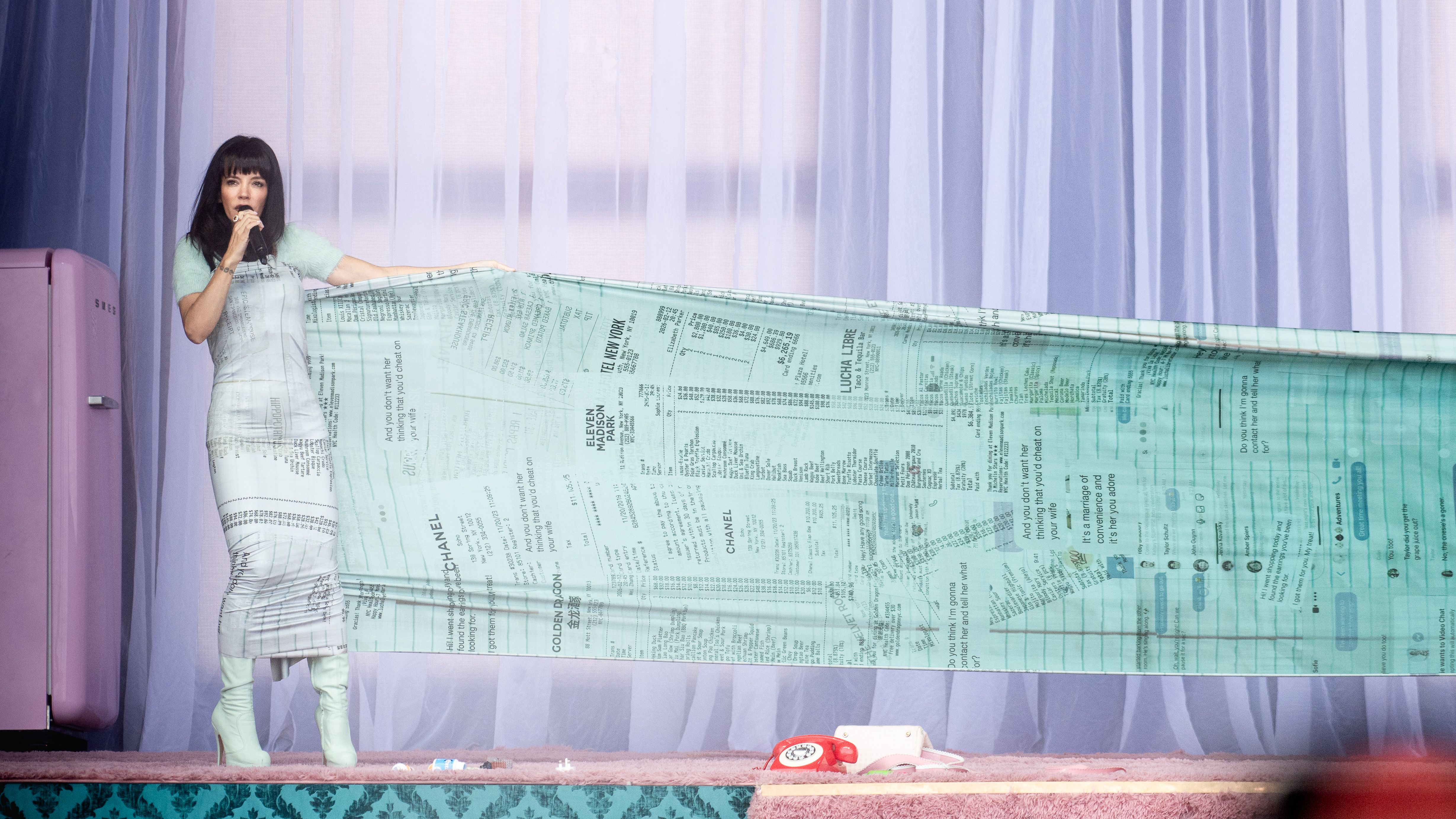 Lily Allen performs during 2026 Lollapalooza Berlin at Olympiapark, in a dress showing the receipts as referenced in the song 4chan Stan