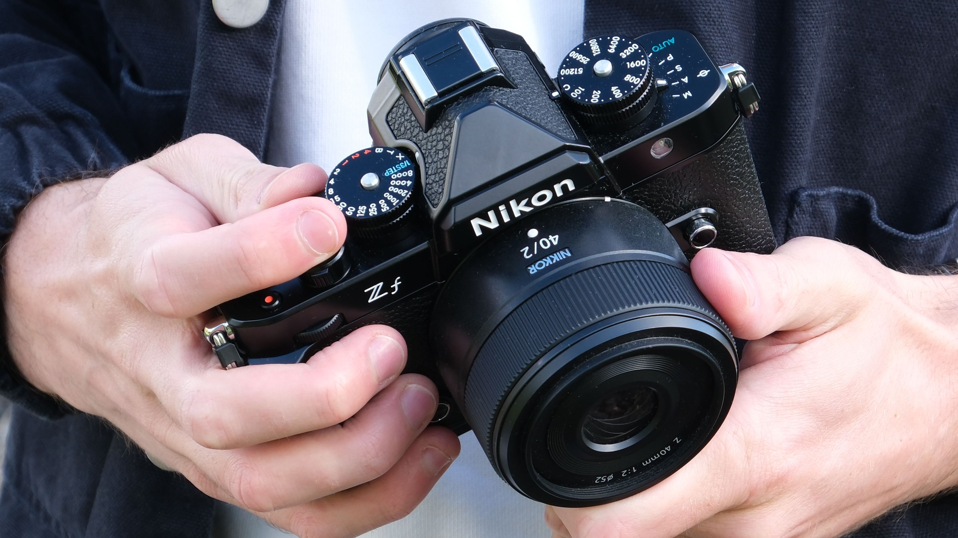 Nikon Zf camera held in hands