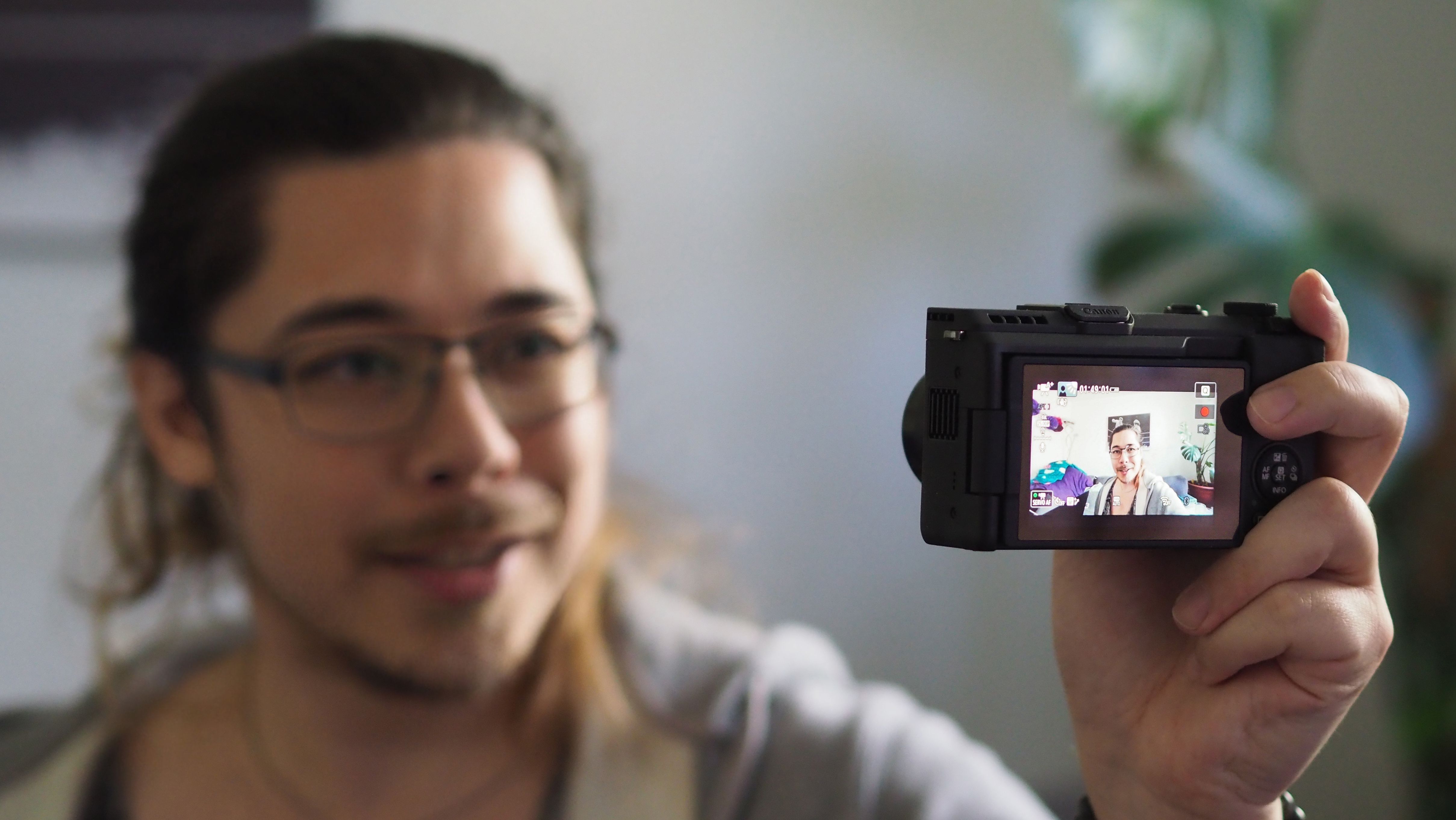 James Artaius using a Canon PowerShot V1 vlogging camera