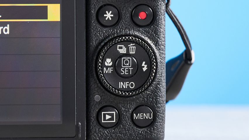 A black Canon PowerShot G7 X Mark III compact camera