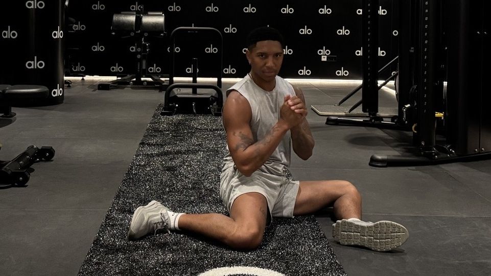 Man demonstrates the hip switch exercise in gym