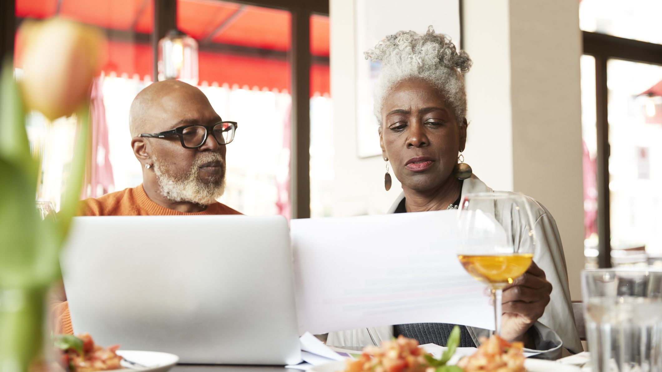 Older couple looking over documents