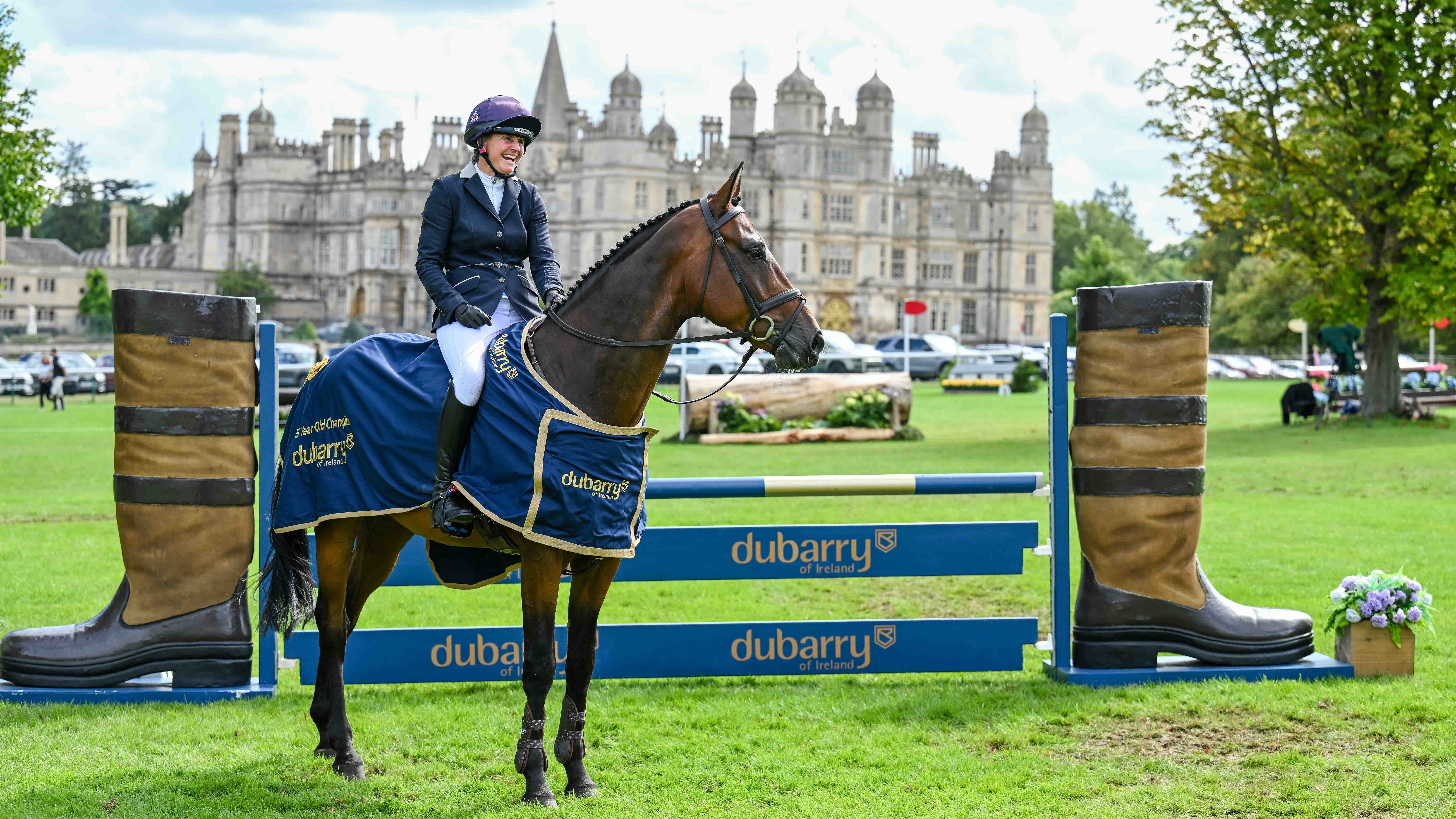 Piggy March riding Quantum Leap in front of Burghley House after winning the 5-year-old Burghley Young Event Horse Championship