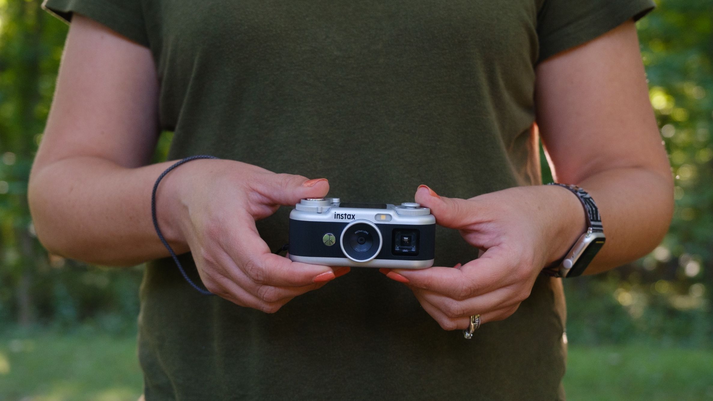 The Instax Pal 2 in a photographer's hands