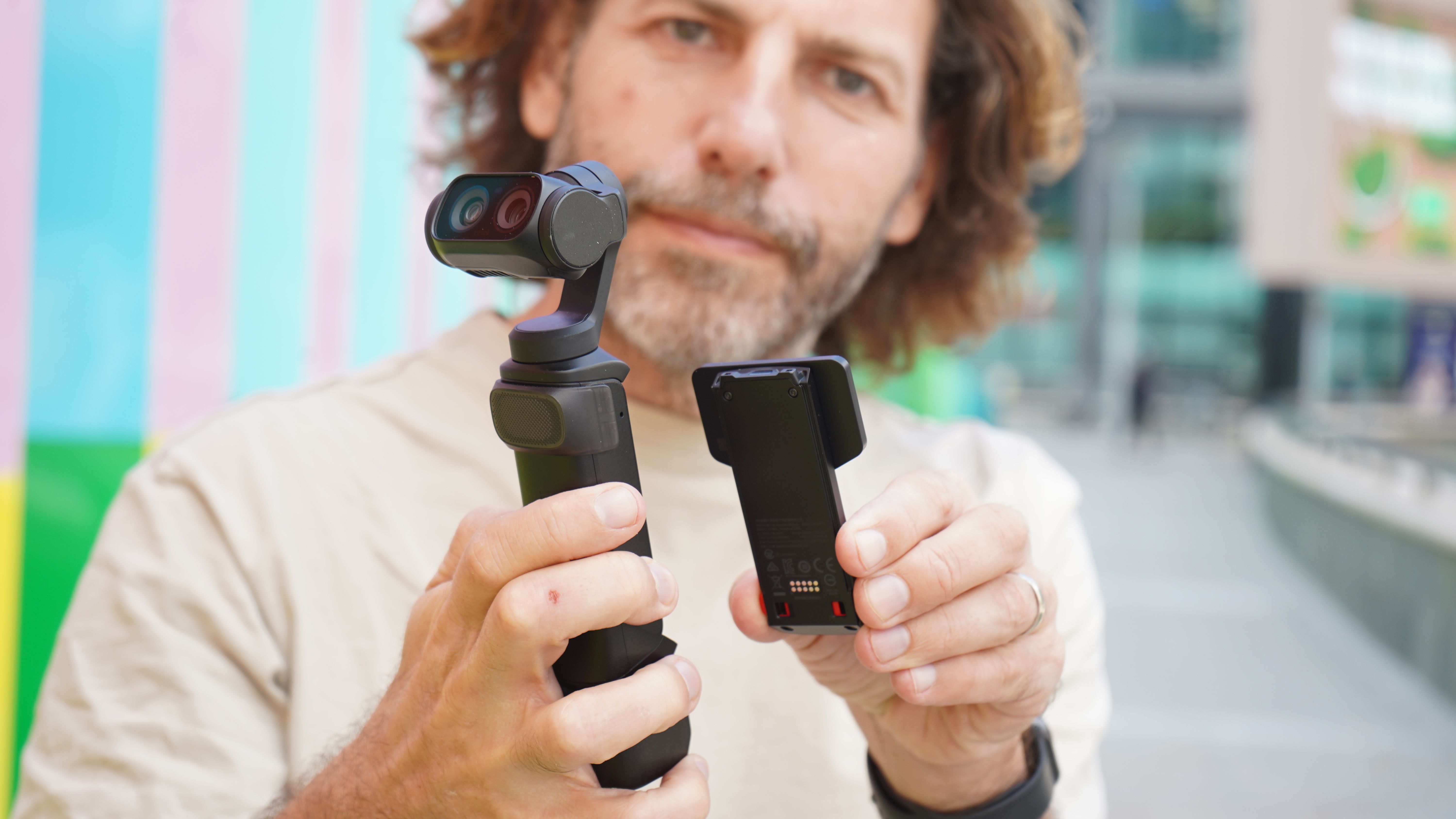 Insta360 Luna Ultra held by Adam Juniper