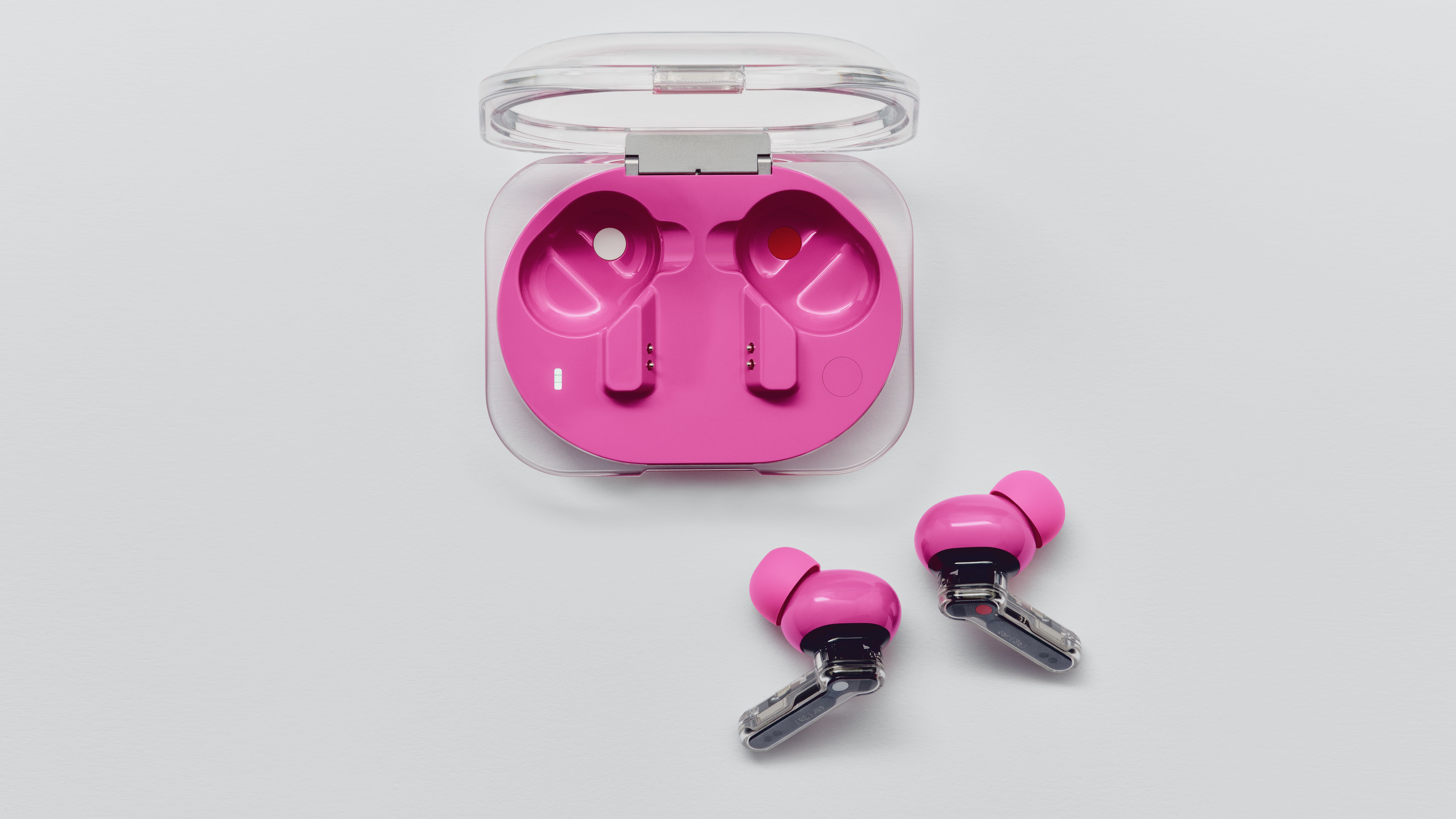 Nothing Ear (3a) in pink on a gray background