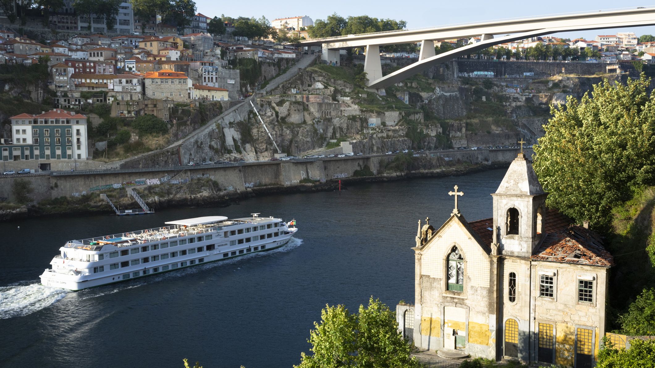 View from Gaia to Douro river with cruise ship, Porto, Portugal
