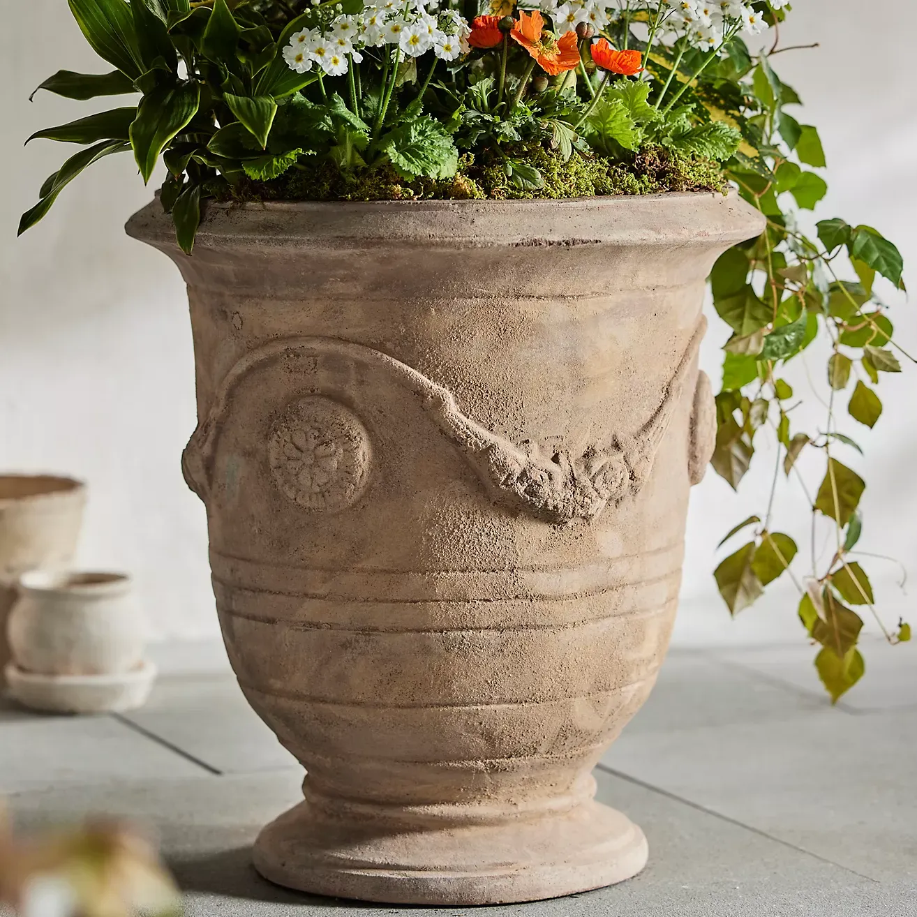 Floral Swag Terracotta Urn