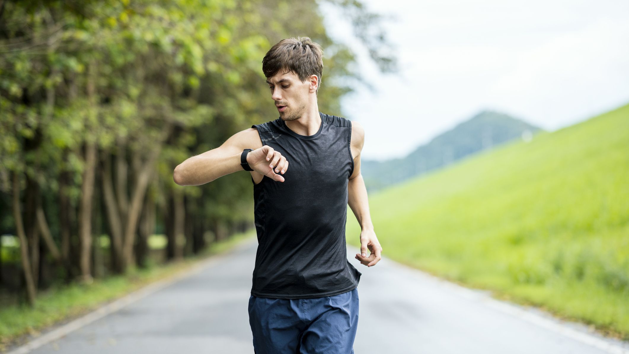Runner looking at watch