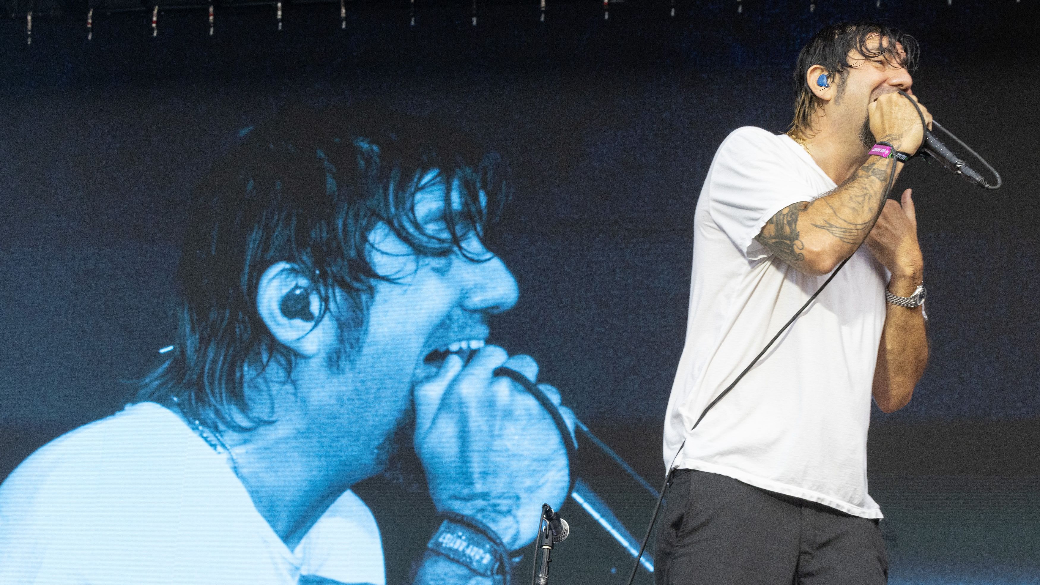 CHICAGO, ILLINOIS - AUGUST 03: Chino Moreno of Deftones performs during Lollapalooza at Grant Park on August 03, 2024 in Chicago, Illinois. (Photo by Barry Brecheisen/WireImage)