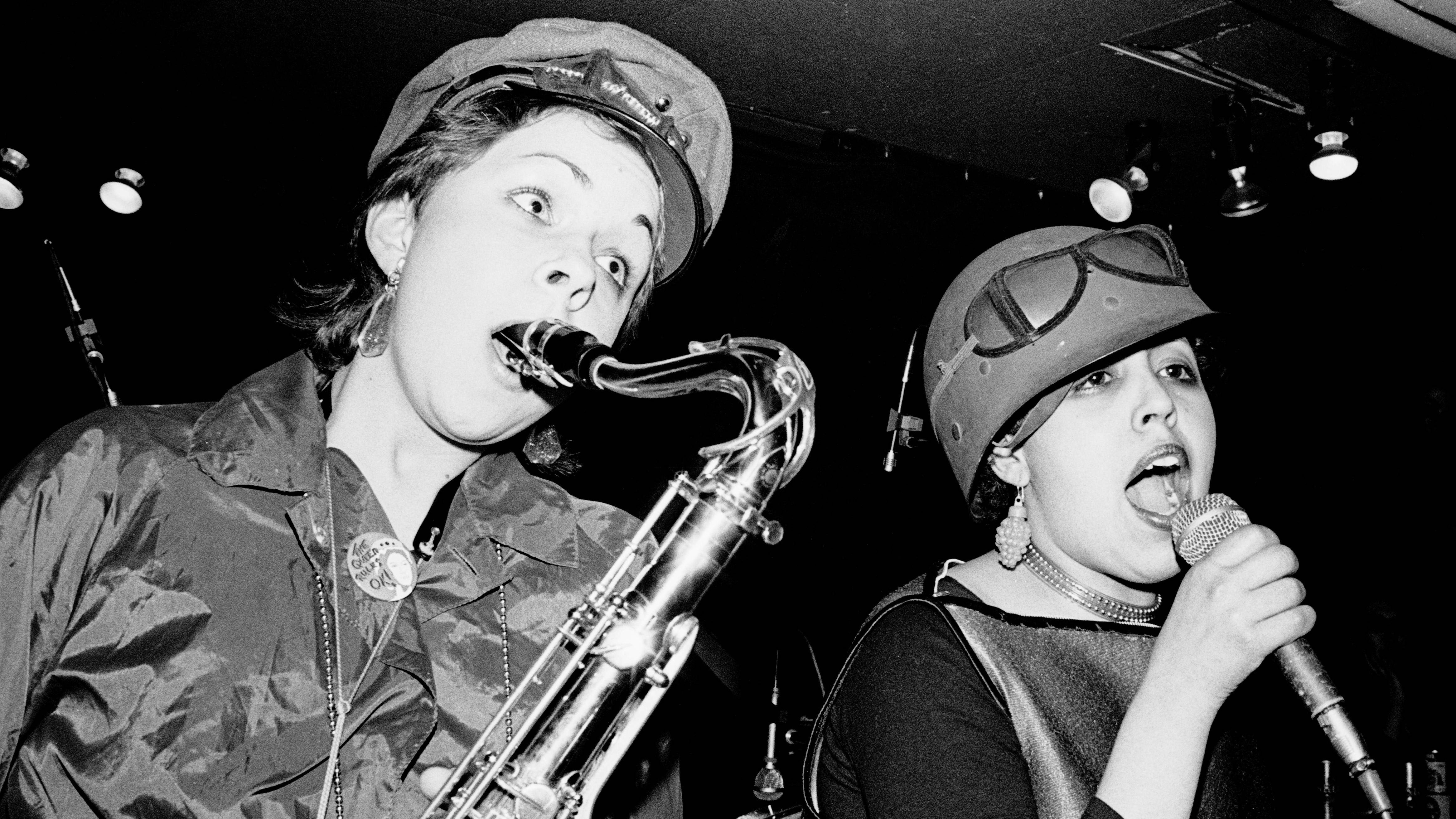 Lora Logic and Poly Styrene of punk band X-Ray Spex, performing on stage at one of their first gigs at The Roxy, London, England, on 11th March 1977. (Photo by Gus Stewart/Redferns)