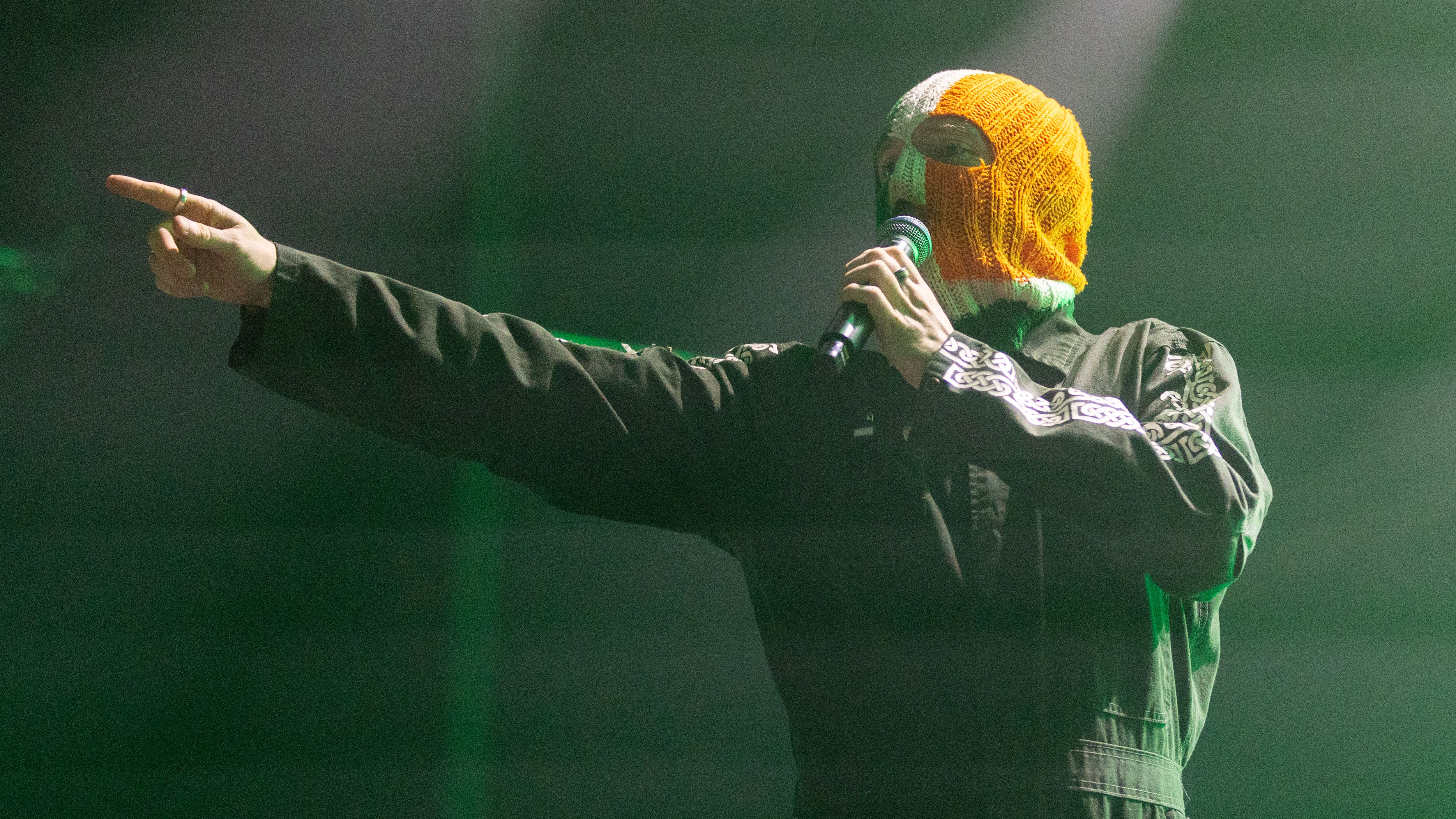 BRISTOL, UNITED KINGDOM - NOVEMBER 18: (EDITORIAL USE ONLY) DJ Prova&amp;iacute; of Kneecap performs on November 18, 2025 in Bristol, England. The Irish-language rap band who are known for making pro-Palestinian and political comments during their live performances and have attracted controversy in the past. (Photo by Matt Cardy/Getty Images)