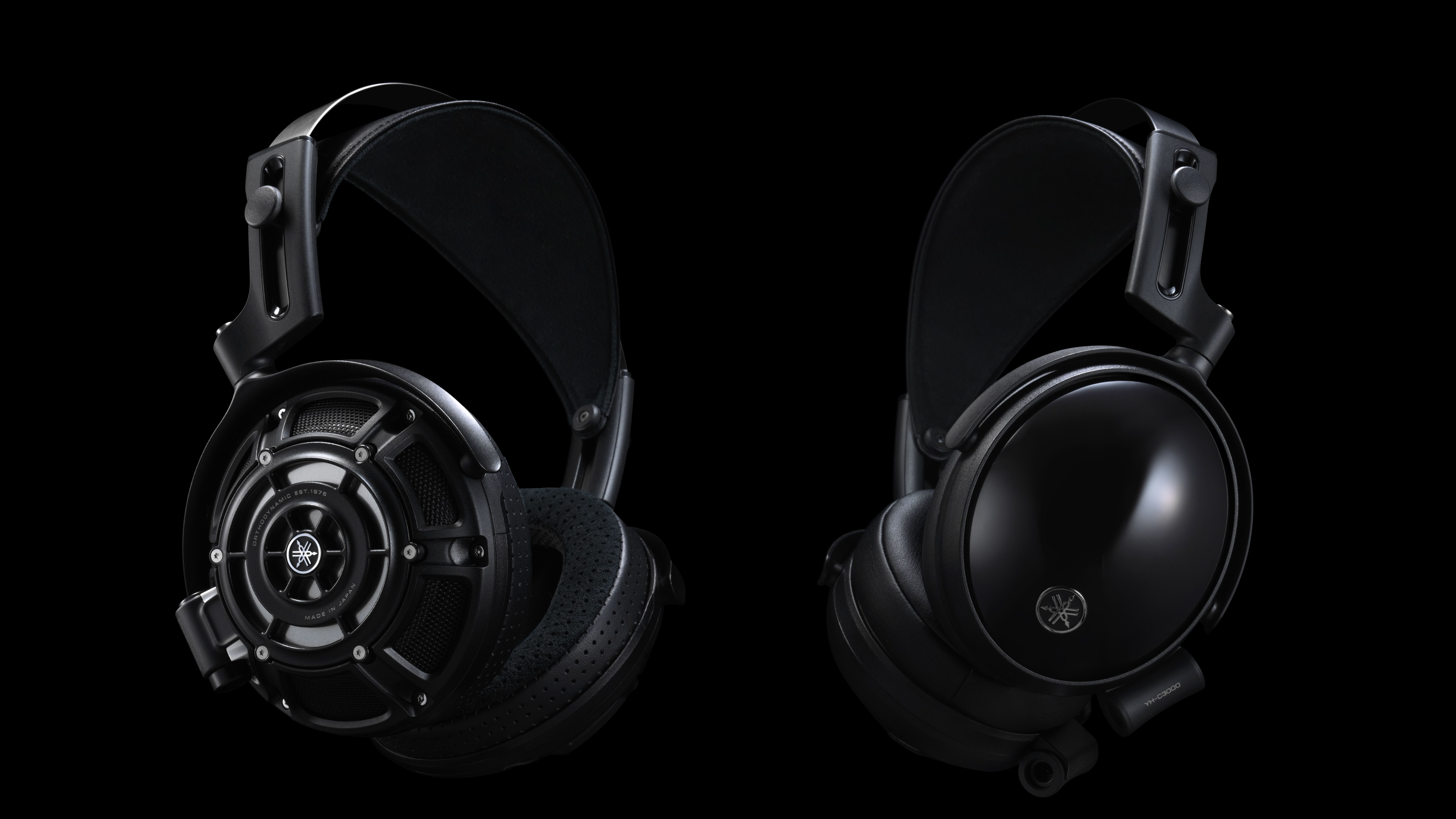 Yamaha YH-4000 and YH-C3000 wired headphones on a black background