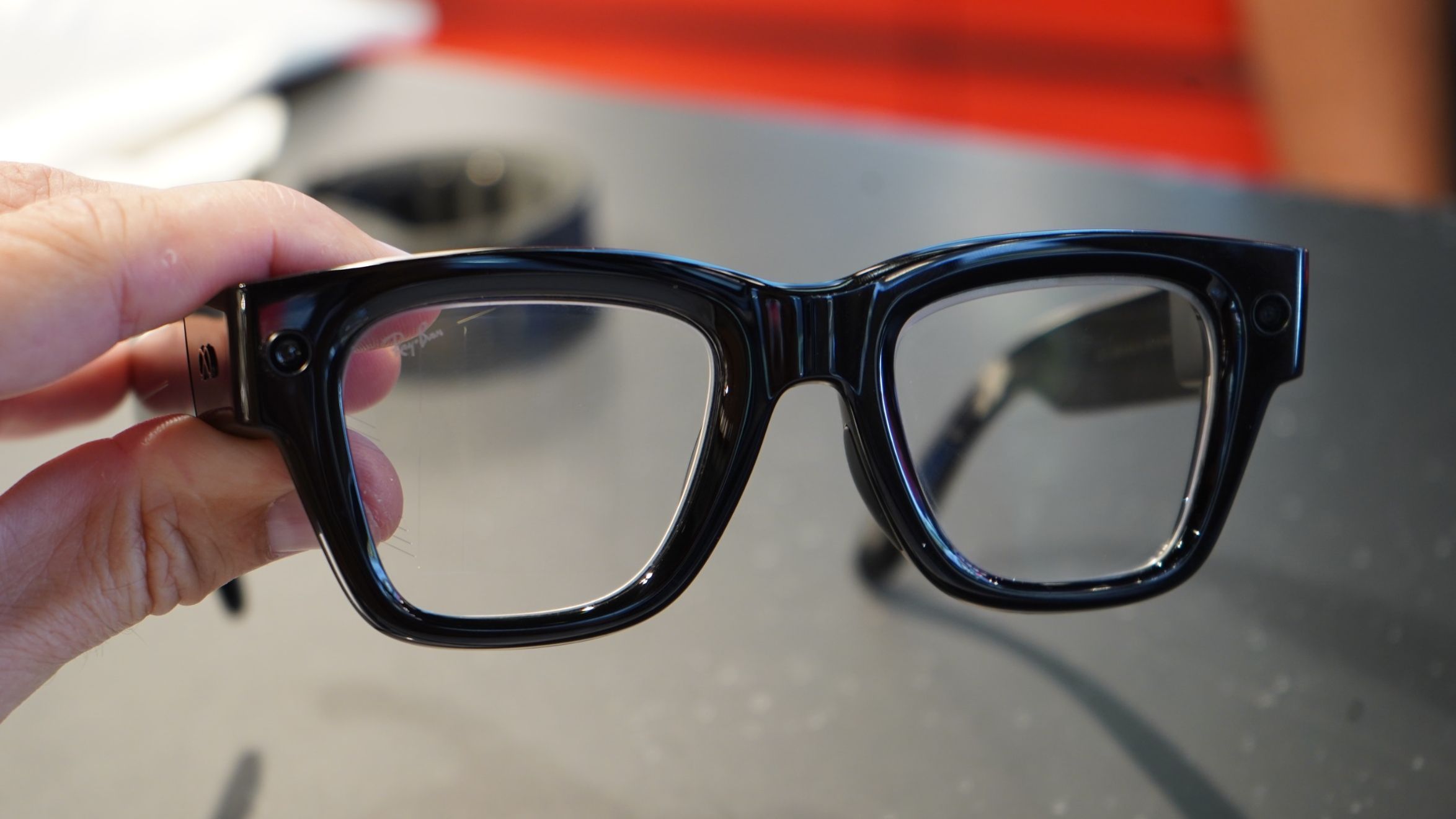 The Meta Ray-Ban Display glasses in Adam Juniper's hand