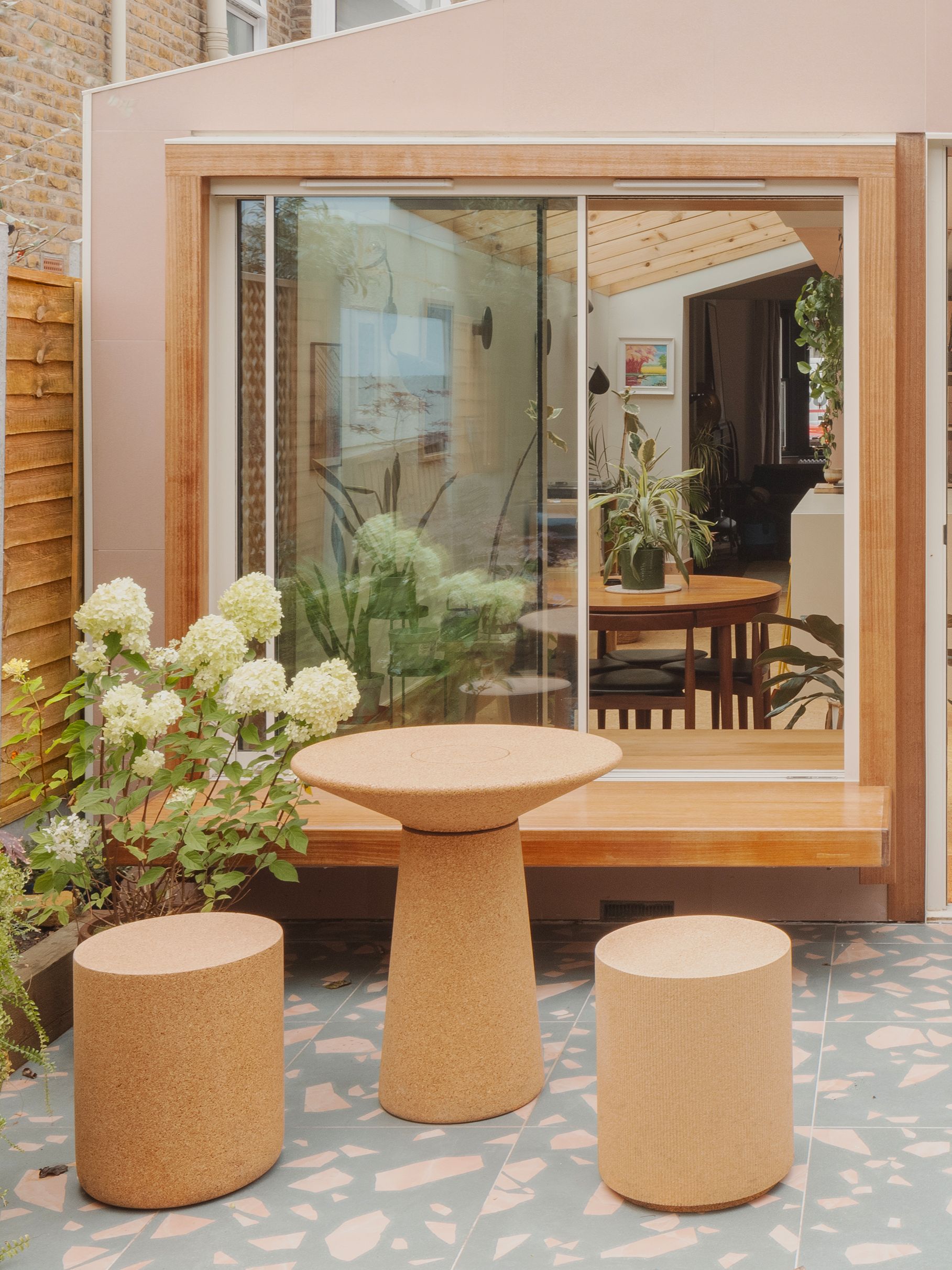 Terrace with cork furniture and terrazzo tiles