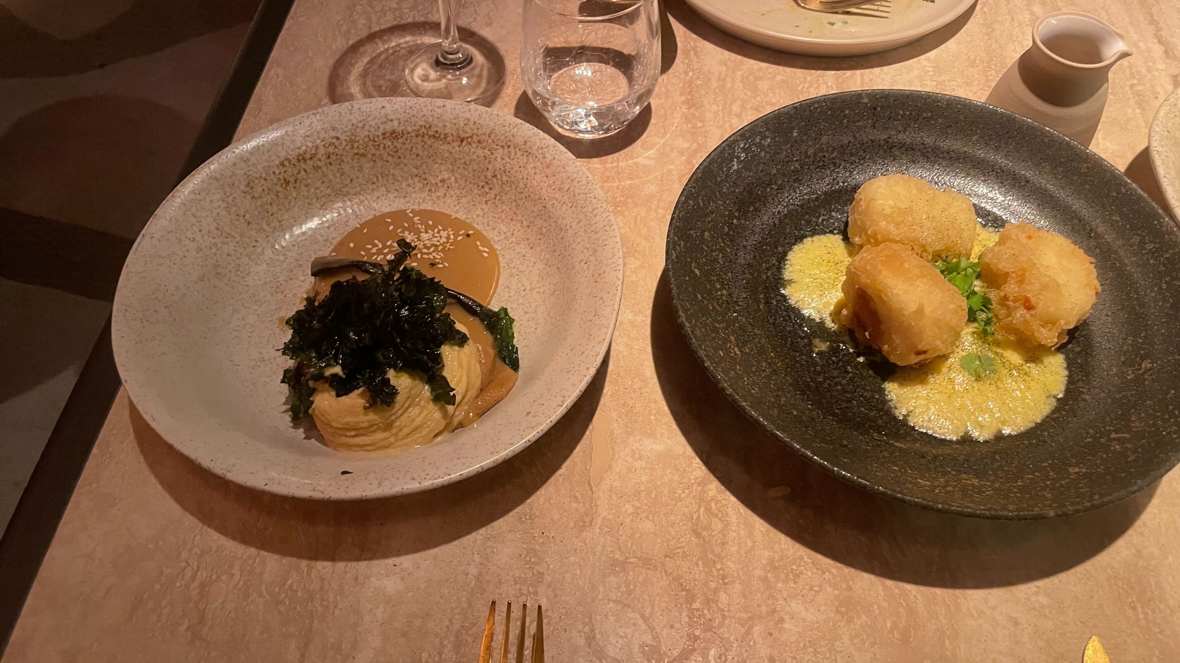 an image of two of the plates at Fenix, the Halloumi Cheese Tempura (V) (R), and Caramelised Aubergine (L)