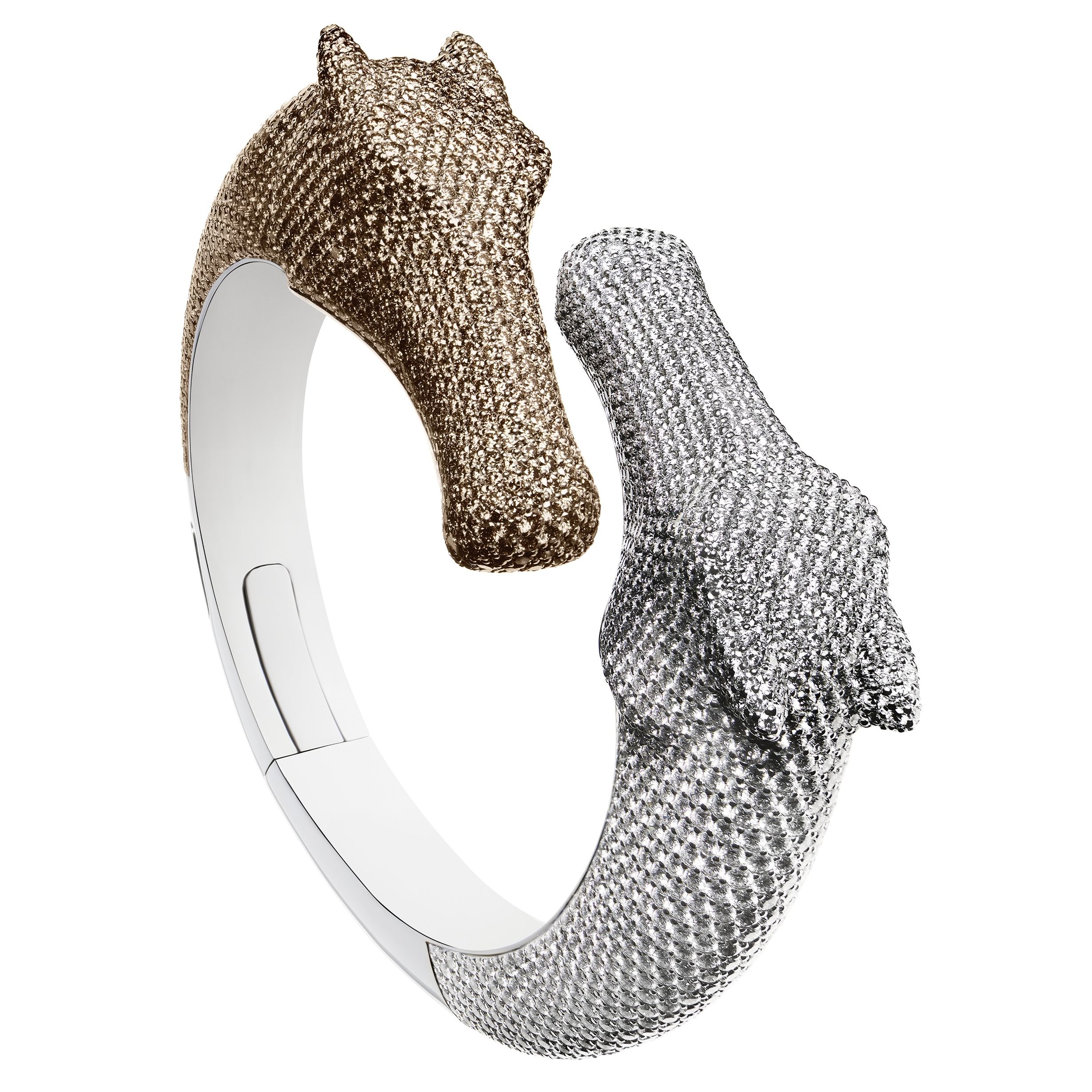 Chunky open bracelet with a horses head at each end