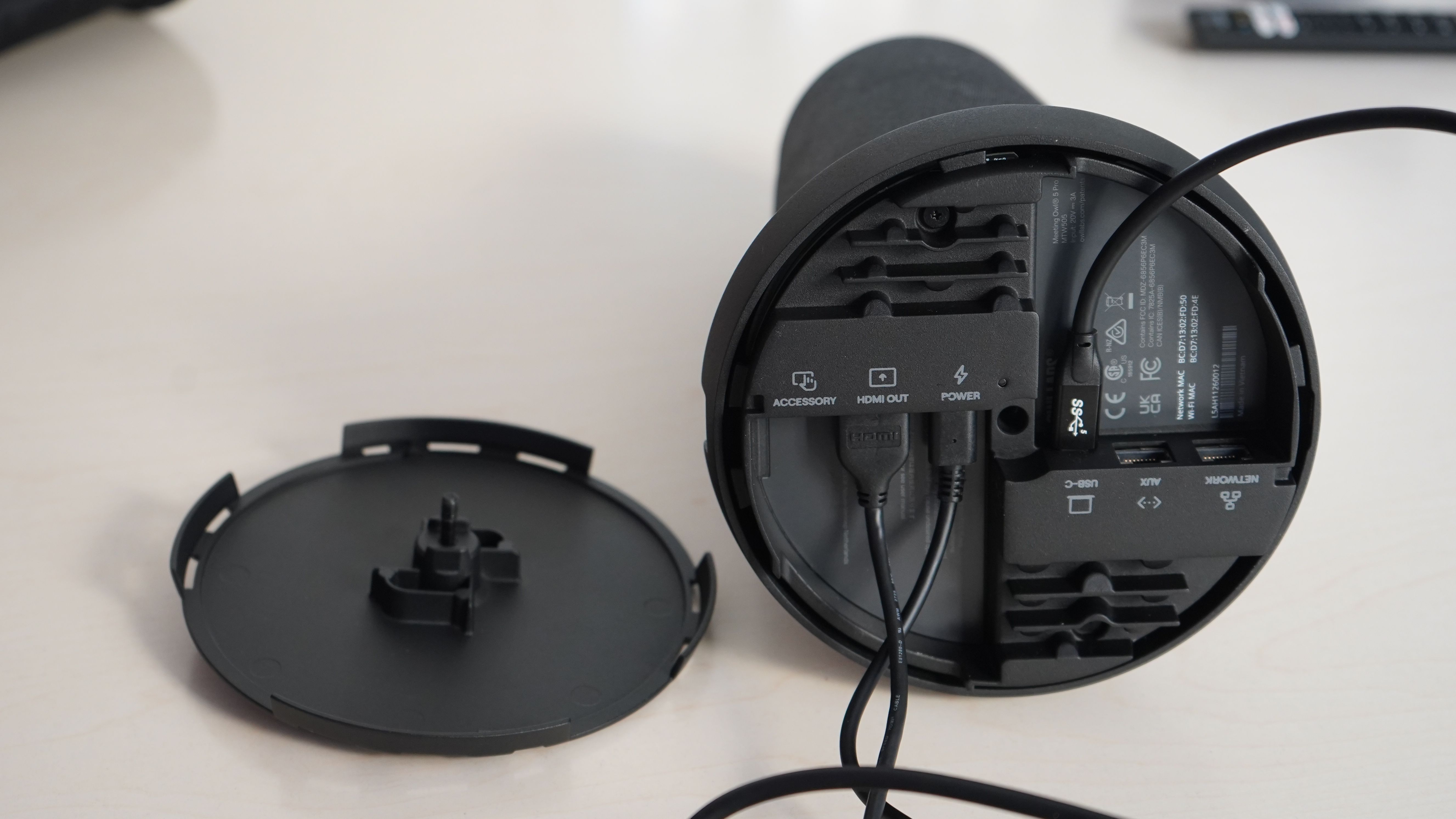 Meeting Owl 5 Pro base opened up to reveal sockets