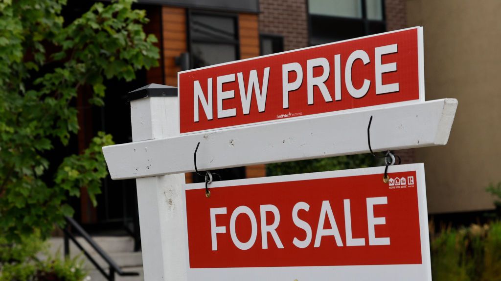 New Price and For Sale signs