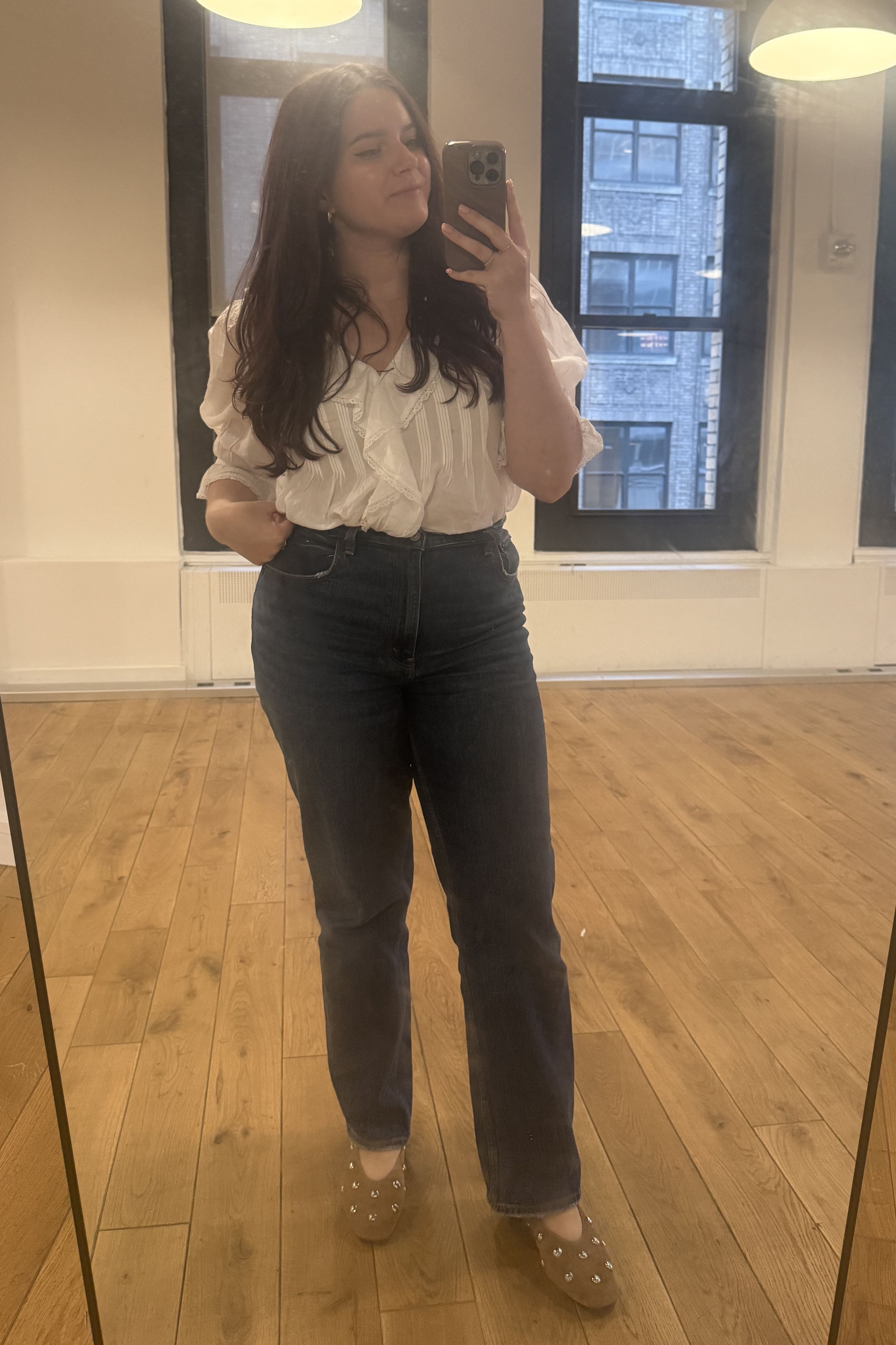 Brooke Knappenberger poses in mirror wearing madewell mylie ballet flats