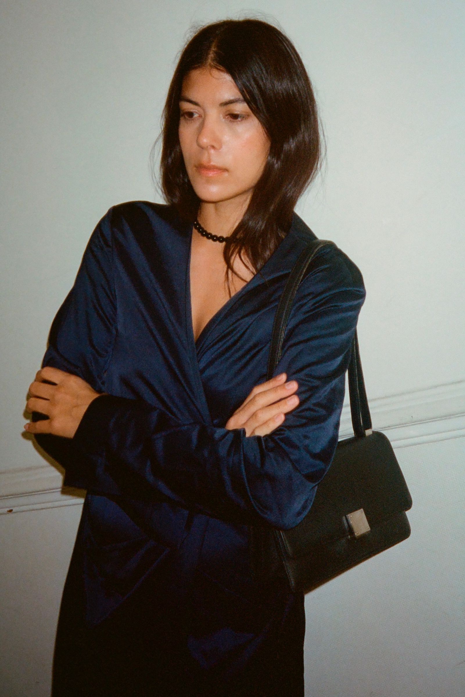 Neada wearing a navy dress