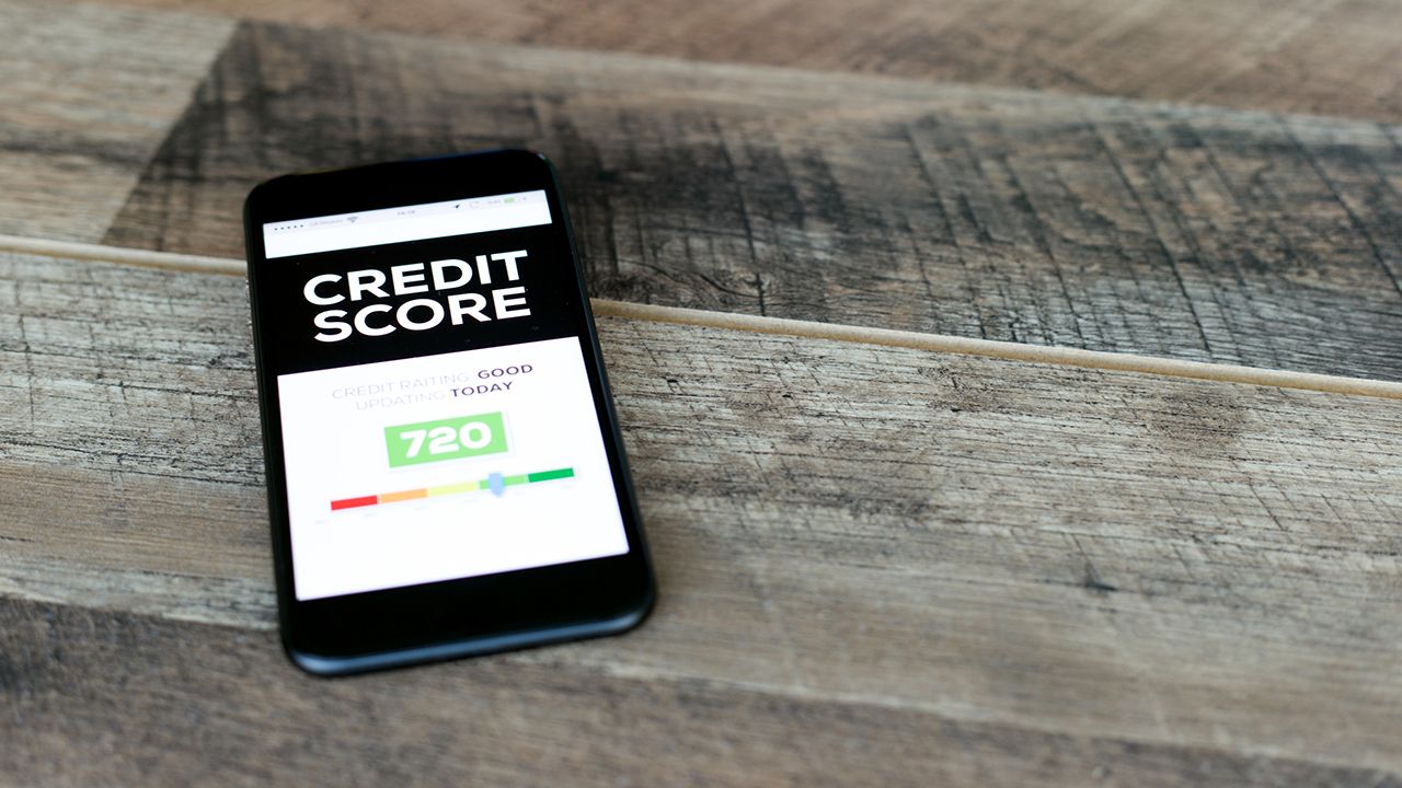 photo of phone showing credit report