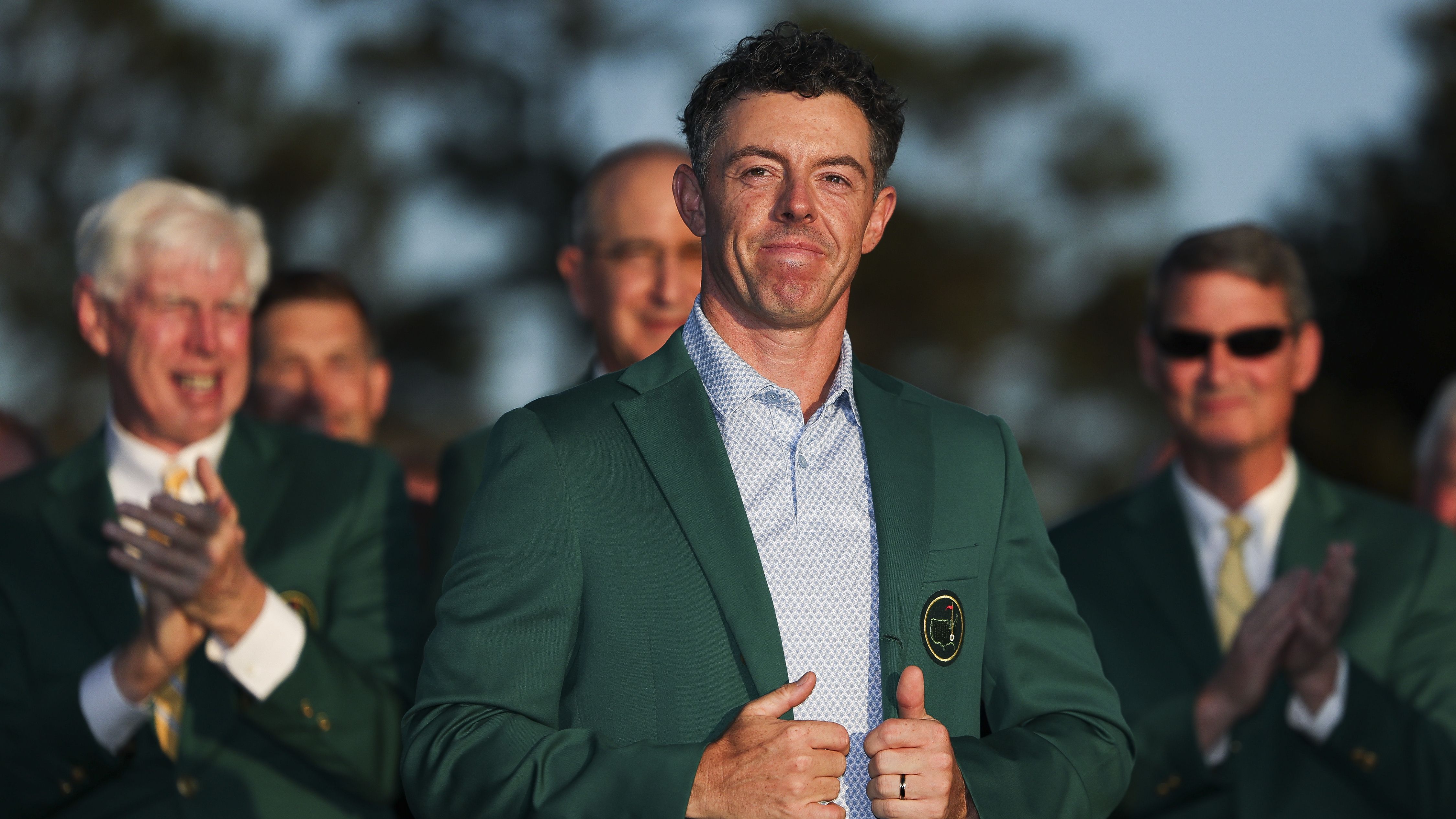 Rory McIlroy dawning his second green jacket after winning the 2026 Masters in Augusta.