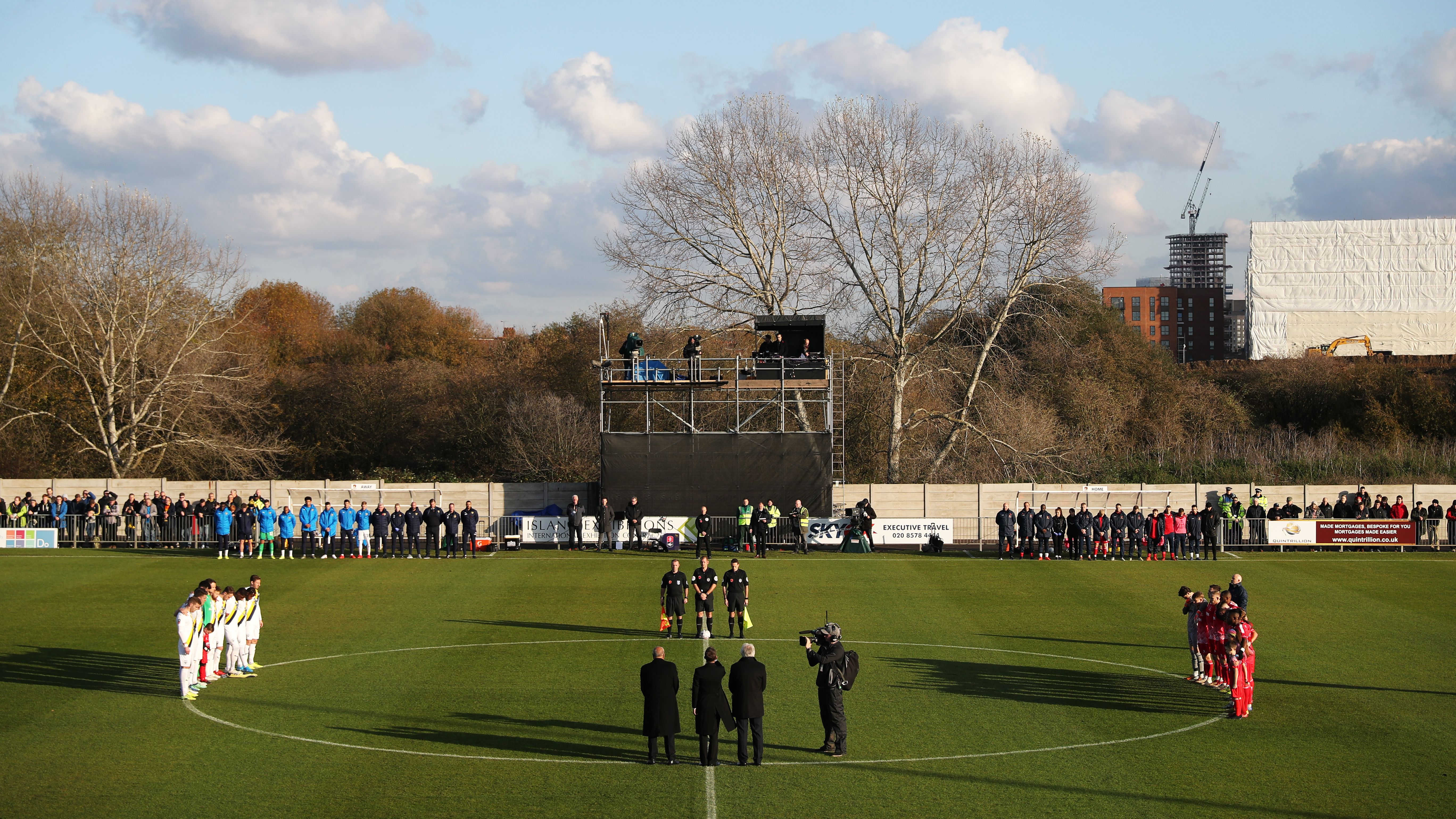 HAYES, ENGLAND - NOVEMBER 10: A silence is observed for Remembrance Day by officials, players and fans prior to the FA Cup First Round match between Hayes &amp;amp; Yeading and Oxford United at SKYEx Community Stadium on November 10, 2019 in Hayes, England. (Photo by Naomi Baker/Getty Images)