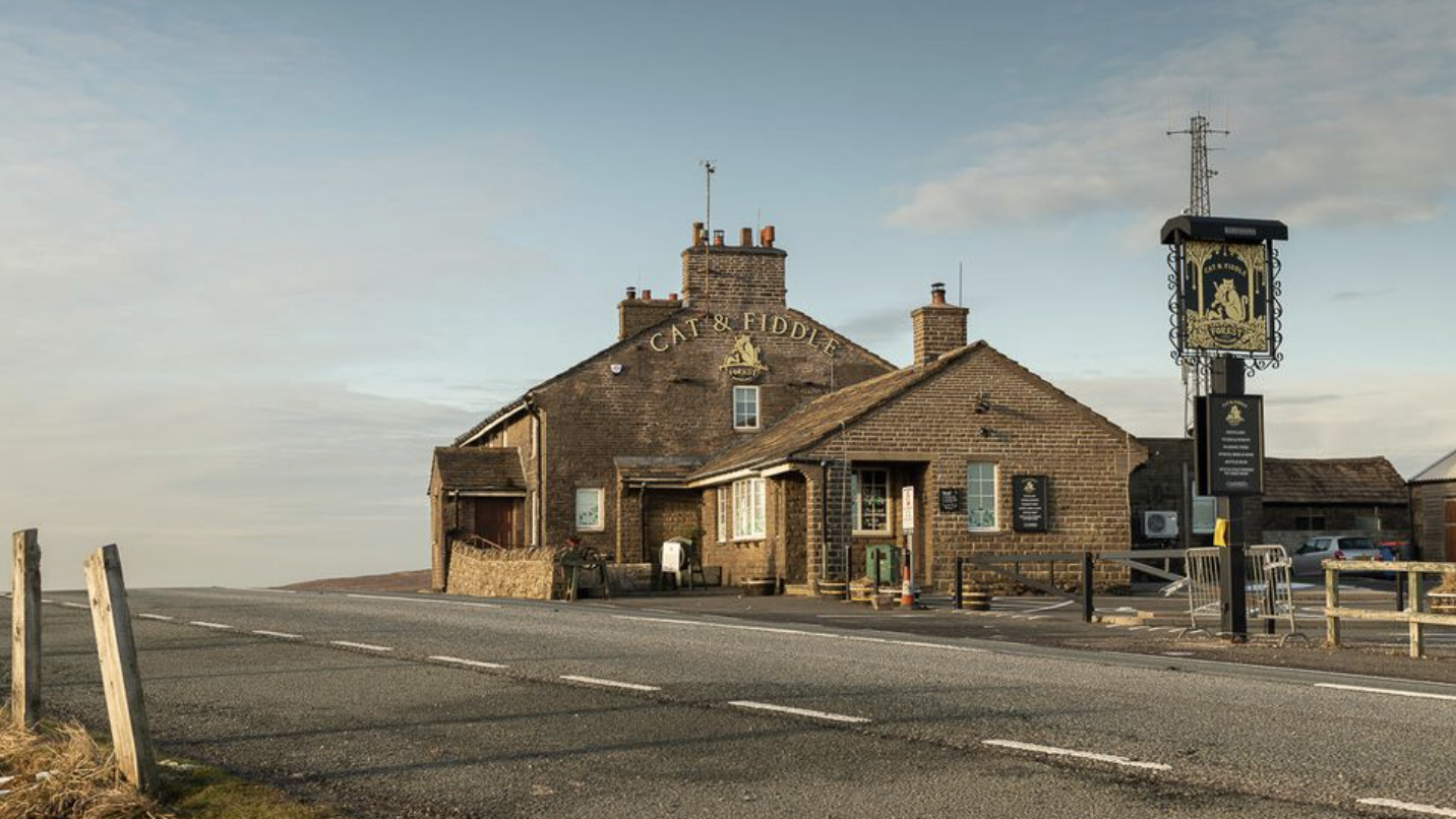 an image of the exterior of the Cat &amp;amp; Fiddle Inn which is part of the Forest Distillery