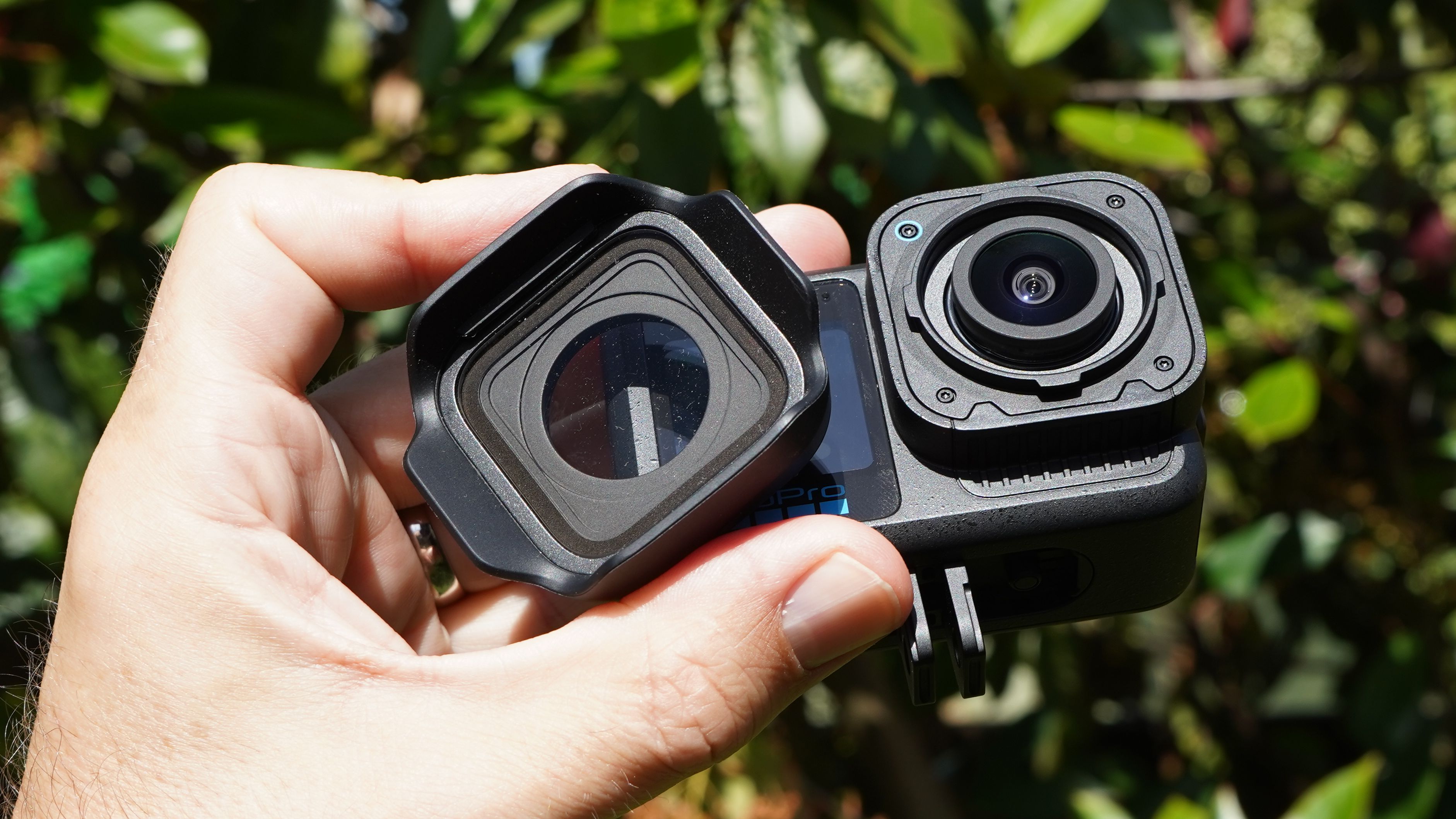 GoPro Mission 1 Pro with detached lens adapter held in my hand