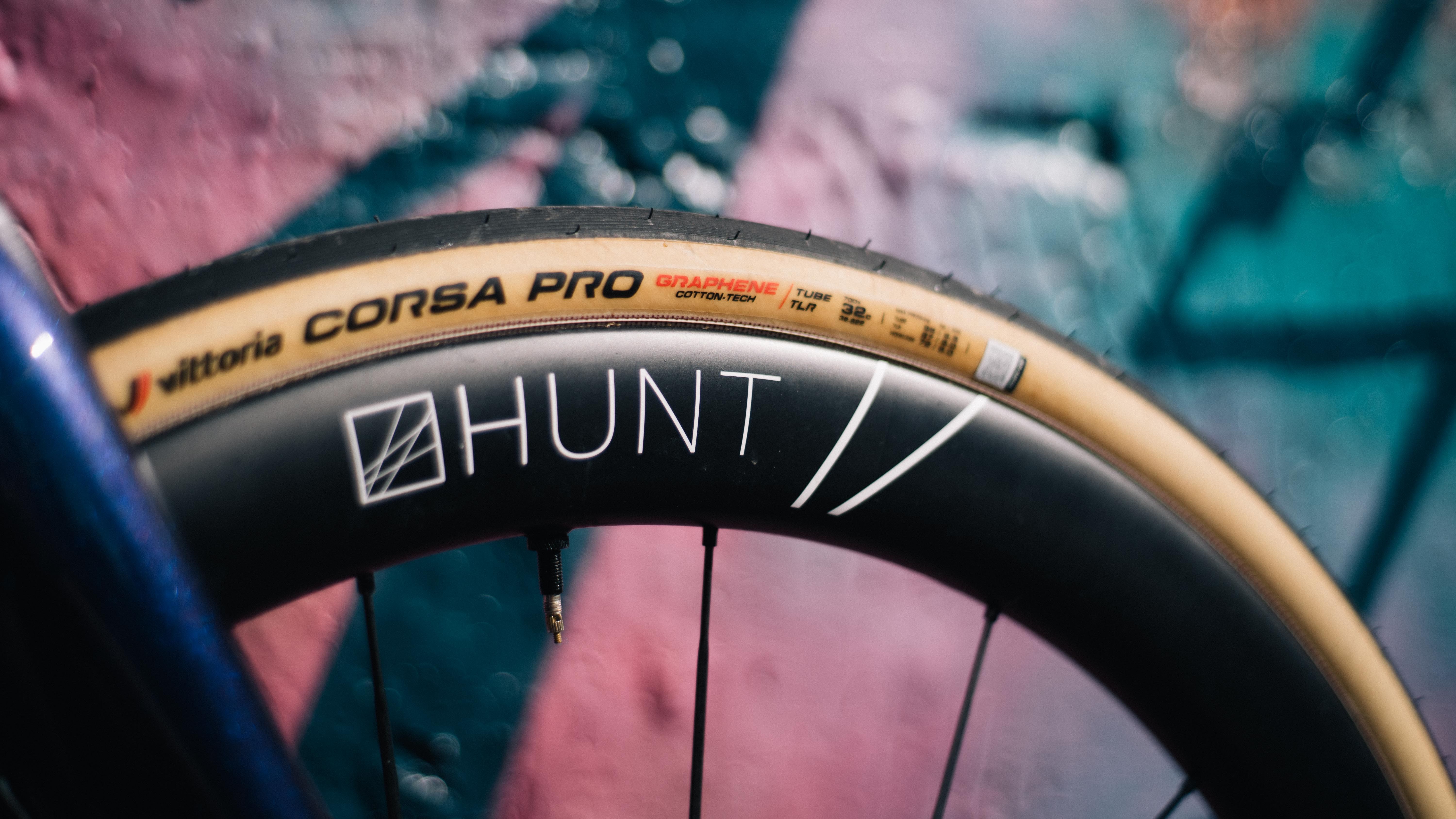 Vittoria Corsa Pro fitted to a black Hunt rim with a graffiti background