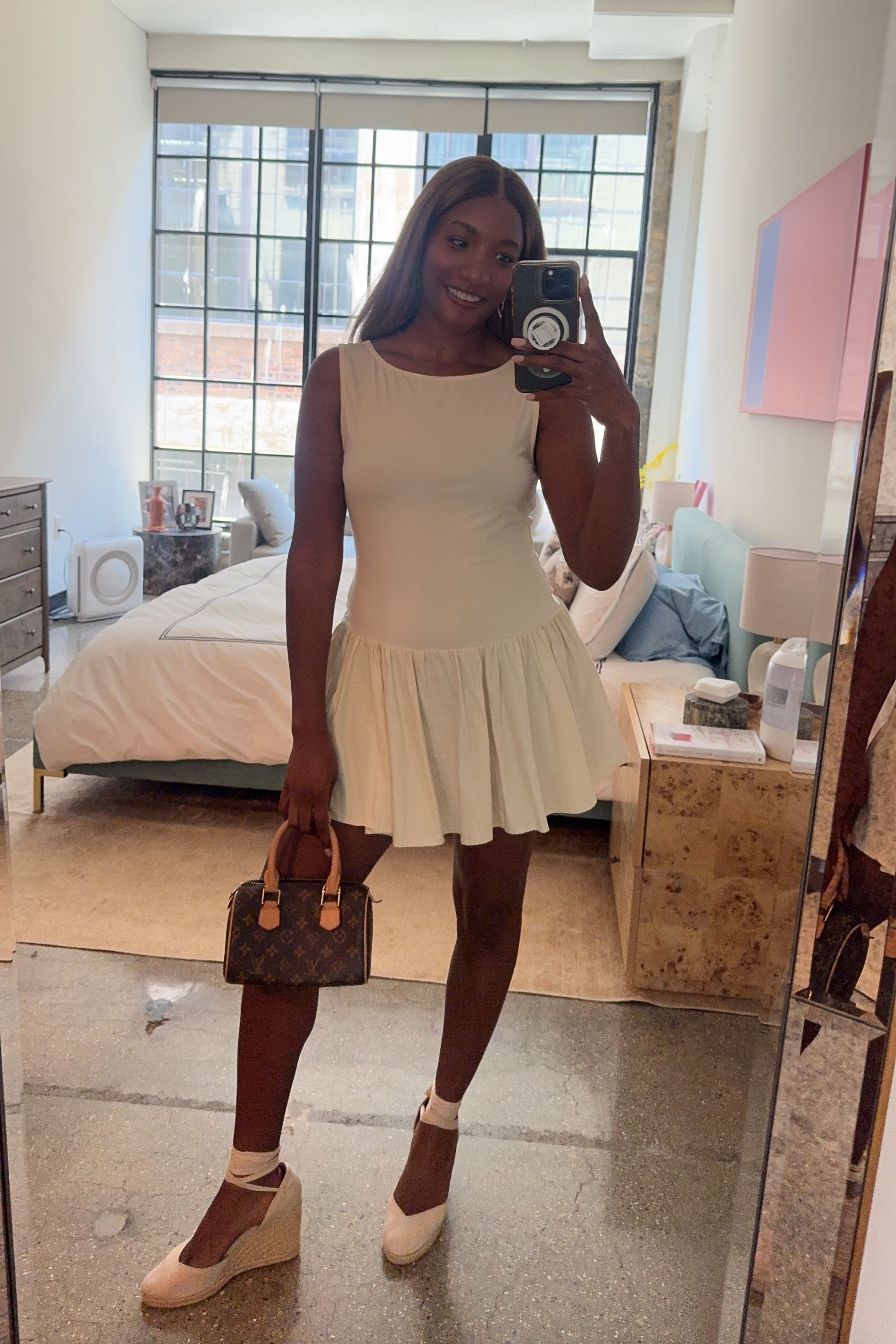Danielle Prescod wears espadrille wedges with a skater dress