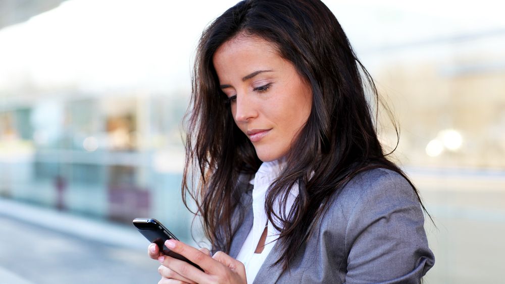 A woman checking her phone