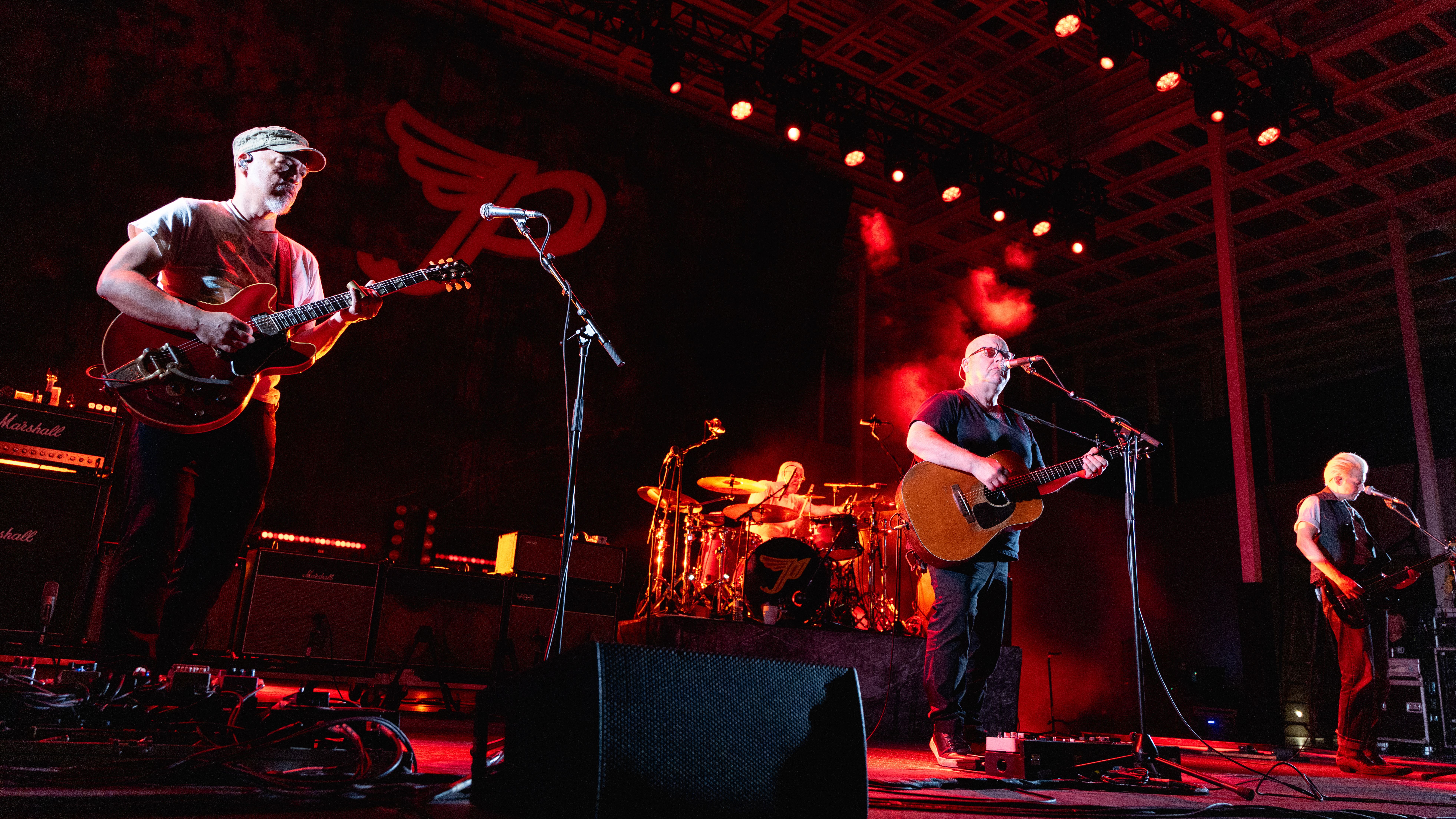 AUSTIN, TEXAS - SEPTEMBER 05: (L-R) Joey Santiago, David Lovering, Black Francis, and Emma Richardson of the Pixies perform in concert at Moody Amphitheater at Waterloo Park on September 05, 2025 in Austin, Texas. (Photo by Rick Kern/Getty Images)