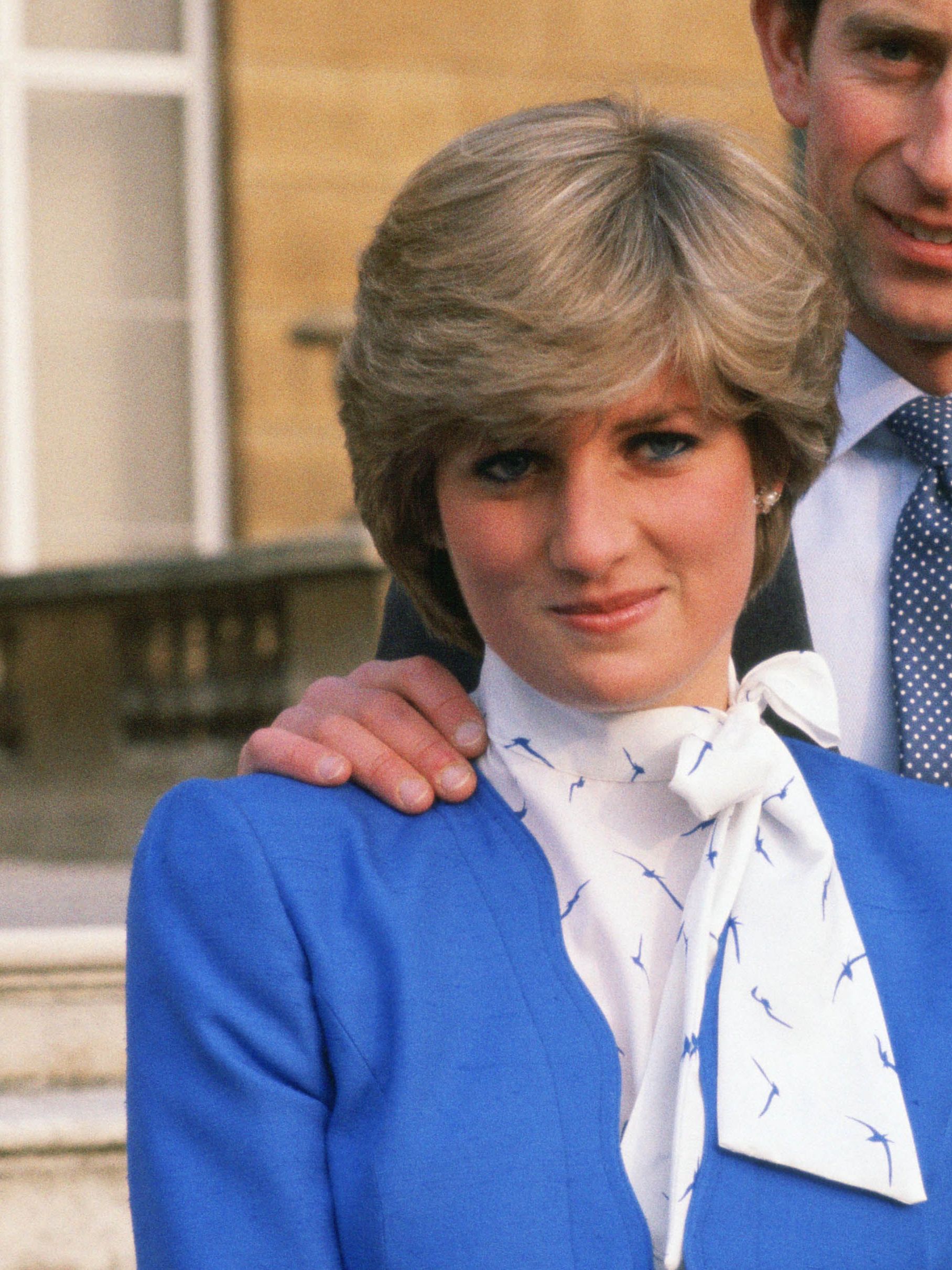 Lady Diana Spencer (later to become Princess of Wales) reveals her sapphire and diamond engagement ring (Photo by Tim Graham Photo Library via Getty Images)