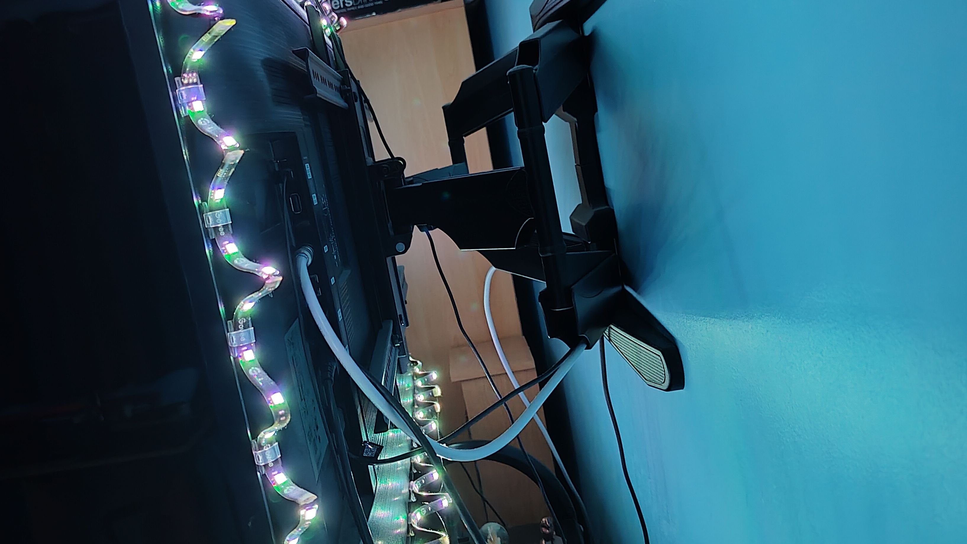 The back of a TV with the Govee Dreamview T1 Backlights attached