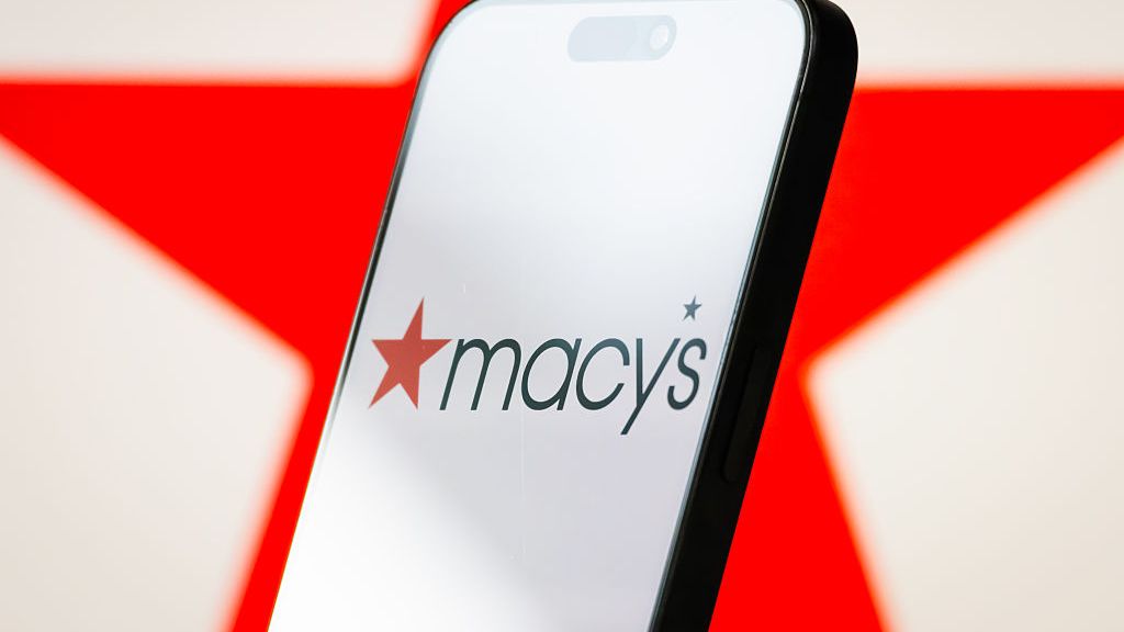 Macy's logo displayed on a smartphone
