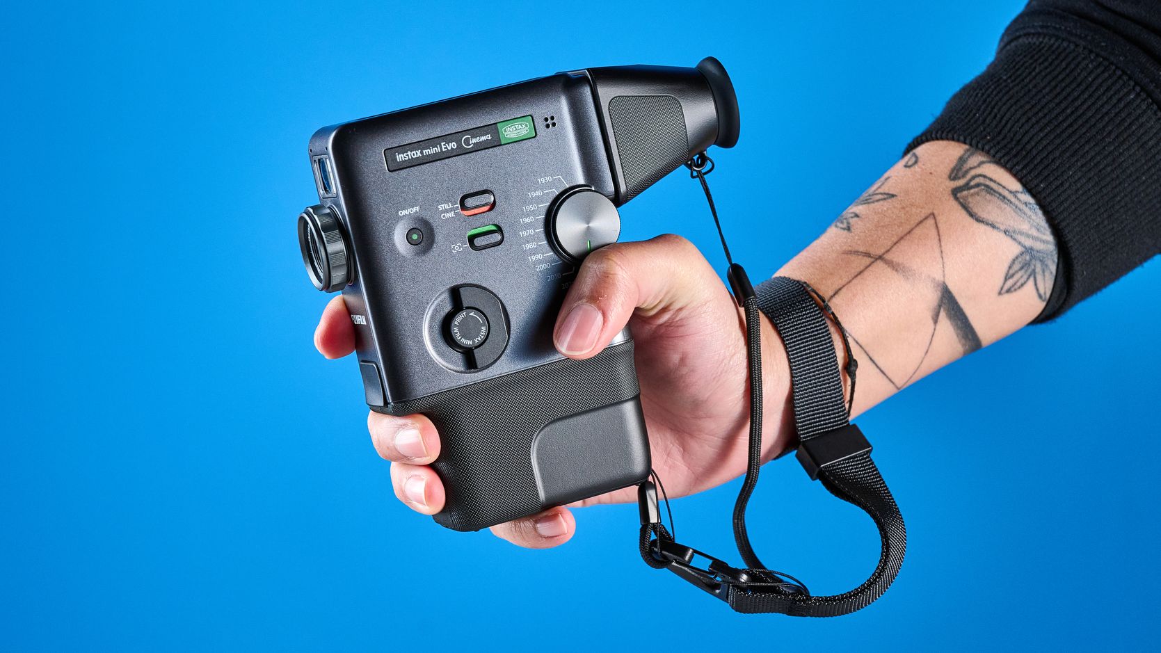 A Fujifilm Instax mini Evo Cinema hybrid instant camera