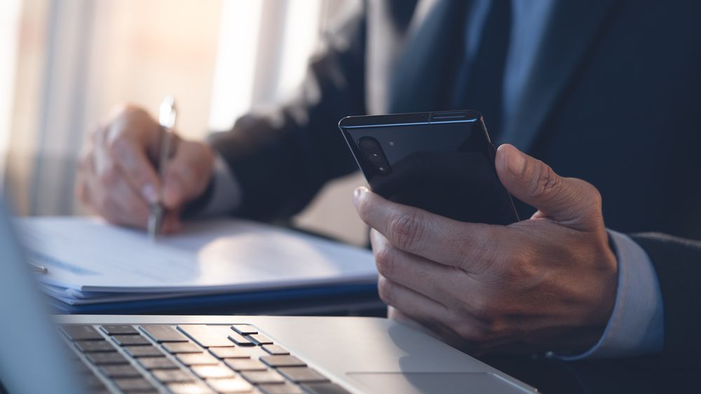 Business professional using smartphone