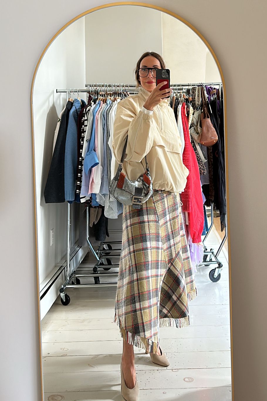 Larissa Mills wearing plaid outfits