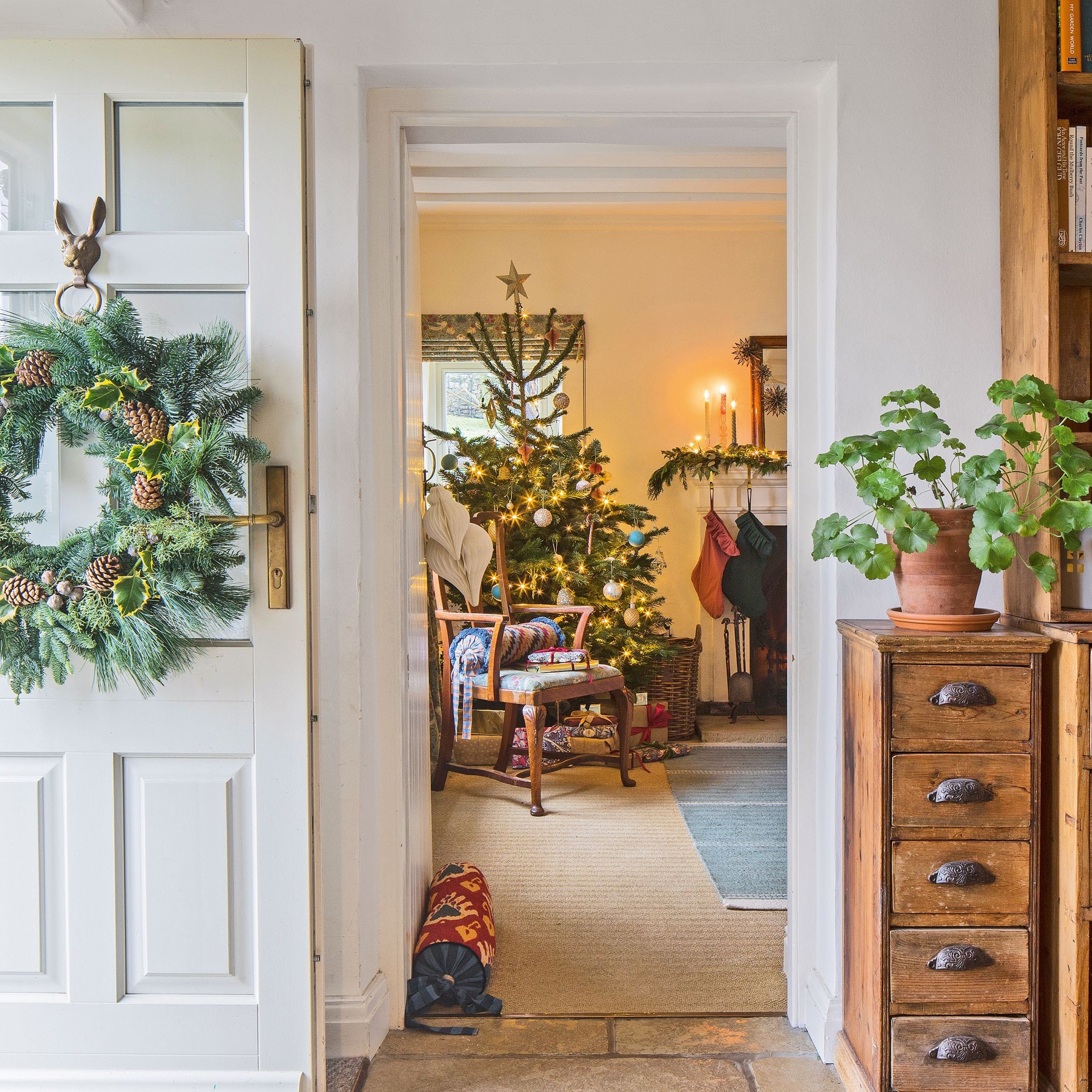 View from a hallway into a living room with christmas tree