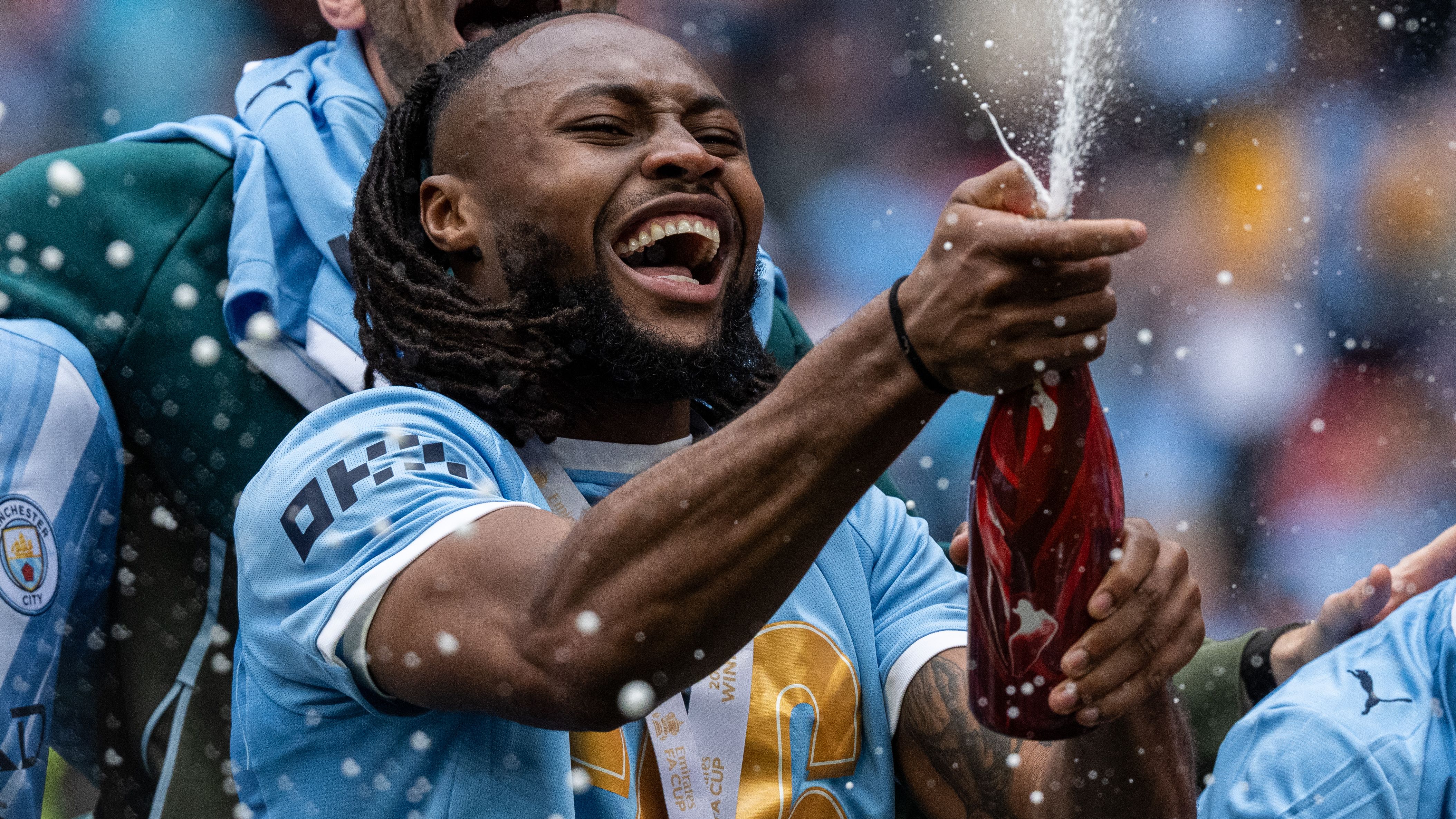 LONDON, ENGLAND - MAY 16: Antoine Semenyo of Manchester City celebrates with with Champagne after the Emirates FA Cup Final match between Chelsea and Manchester City on May 16, 2026 in London, England. (Photo by Sebastian Frej/Getty Images)