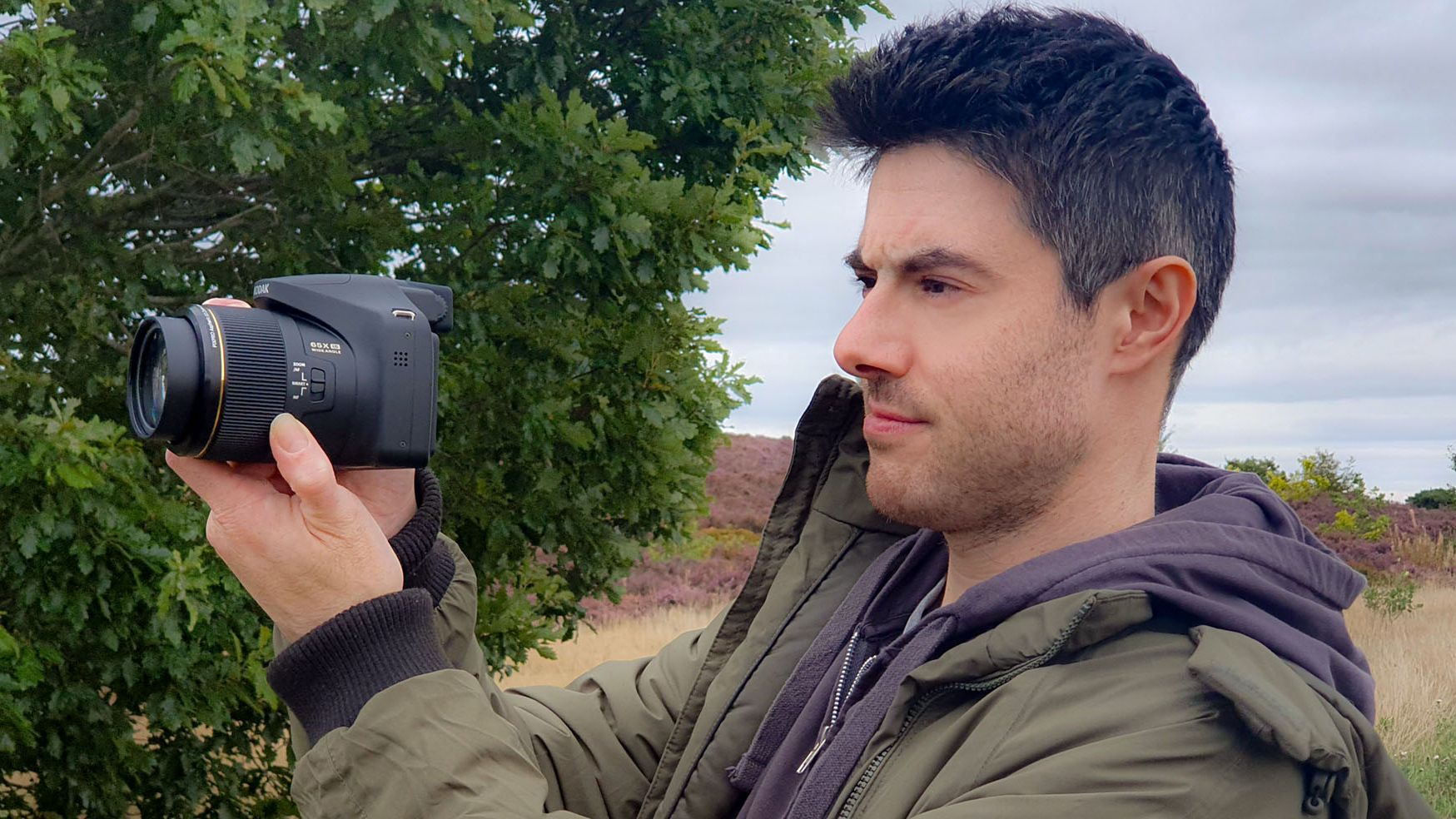 A man holding the Kodak AZ653