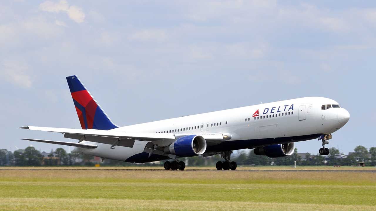 Schiphol, The Netherlands - June 12, 2011: Delta airlines N188DN Boeing 767 plane taking off from Schiphol Airport in The Netherlands on a sunny day.
