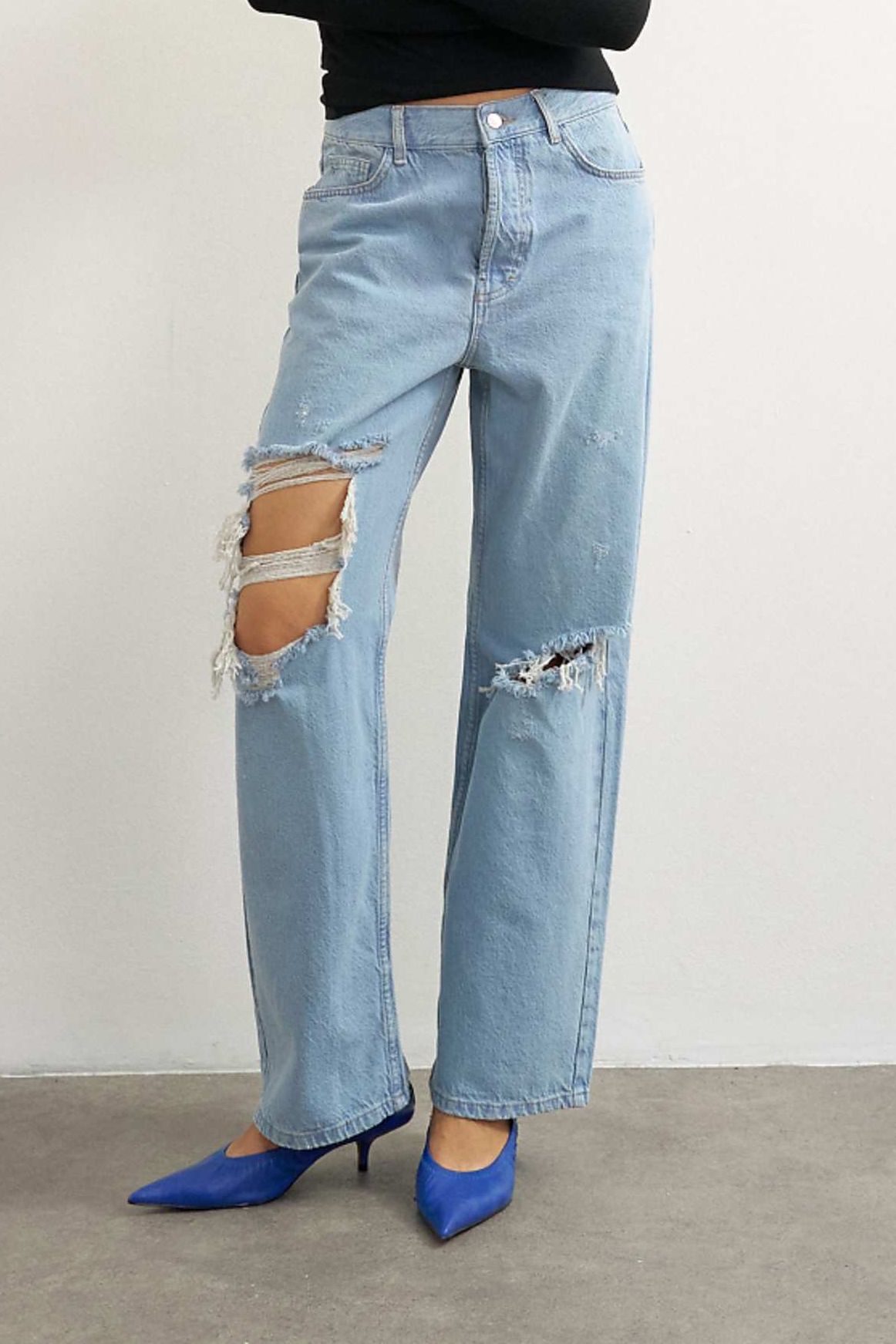 Topshop Column Mid Rise Jeans With Extreme Rips in Bleach