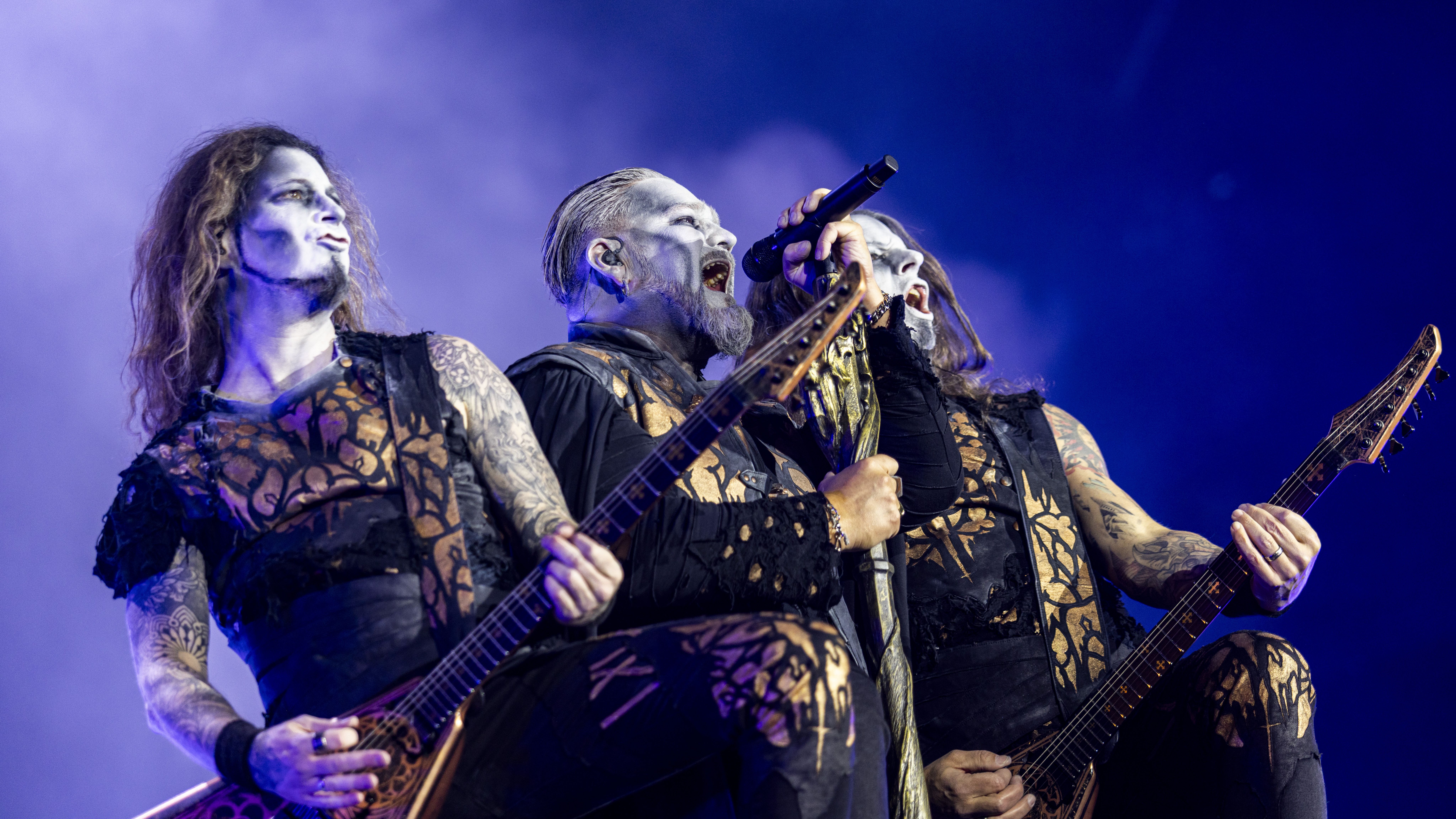 NUERBURG, GERMANY - JUNE 08: (L-R) Matthew Greywolf, Attila Dorn and Charles Greywolf of the band Powerwolf perform live on stage during day 3 of the Rock Am Ring Festival at Nuerburgring on June 08, 2025 in Nuerburg, Germany. (Photo by Gina Wetzler/Redferns)