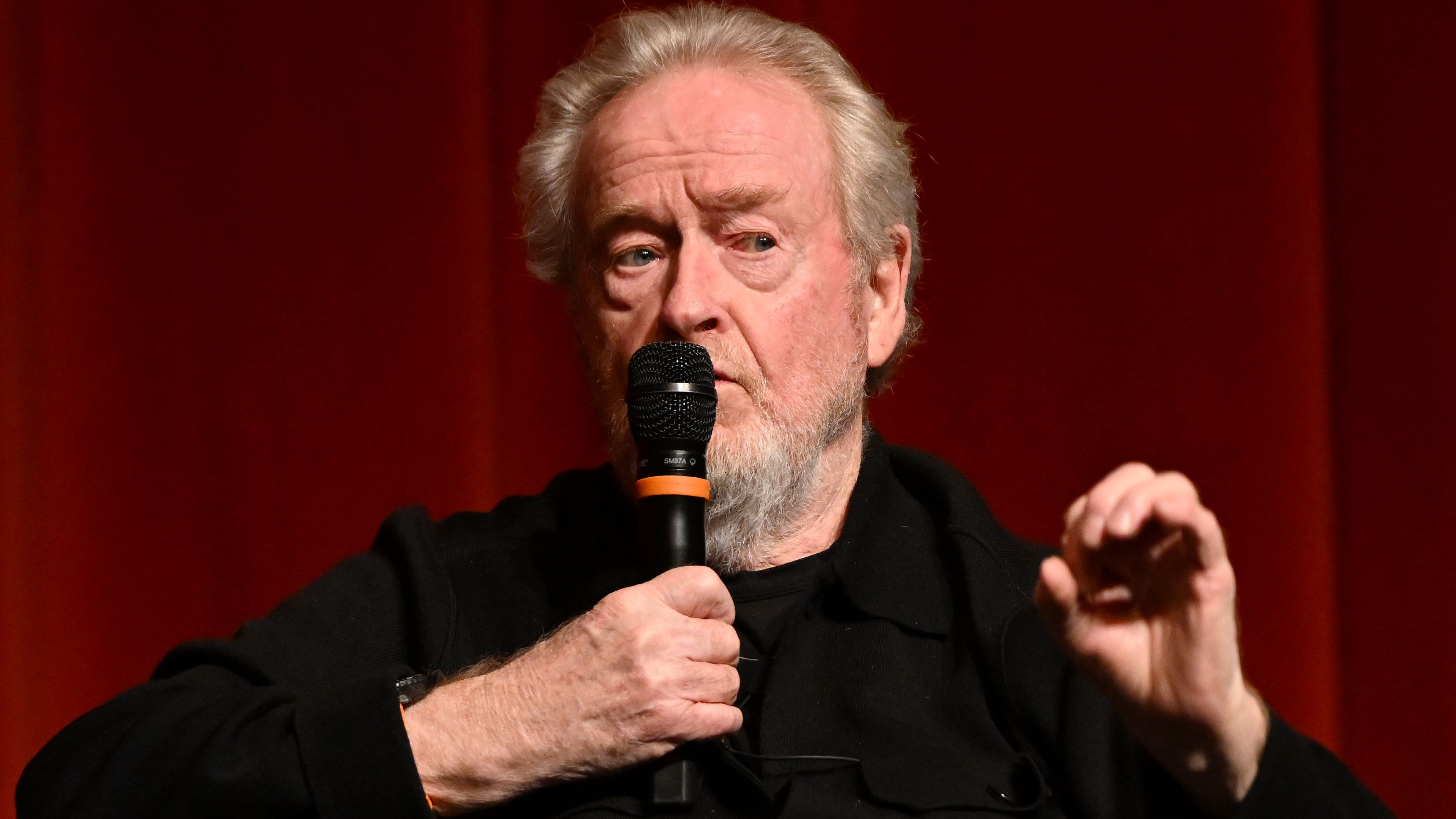 LOS ANGELES, CALIFORNIA - DECEMBER 10: Ridley Scott speaks onstage during a Gladiator II; conversation with Director Ridley Scott and Director Christopher Nolan in Los Angeles at the DGA Theater Complex on December 10, 2024, in Los Angeles, California. (Photo by Vivien Killilea/Getty Images for Paramount Pictures)