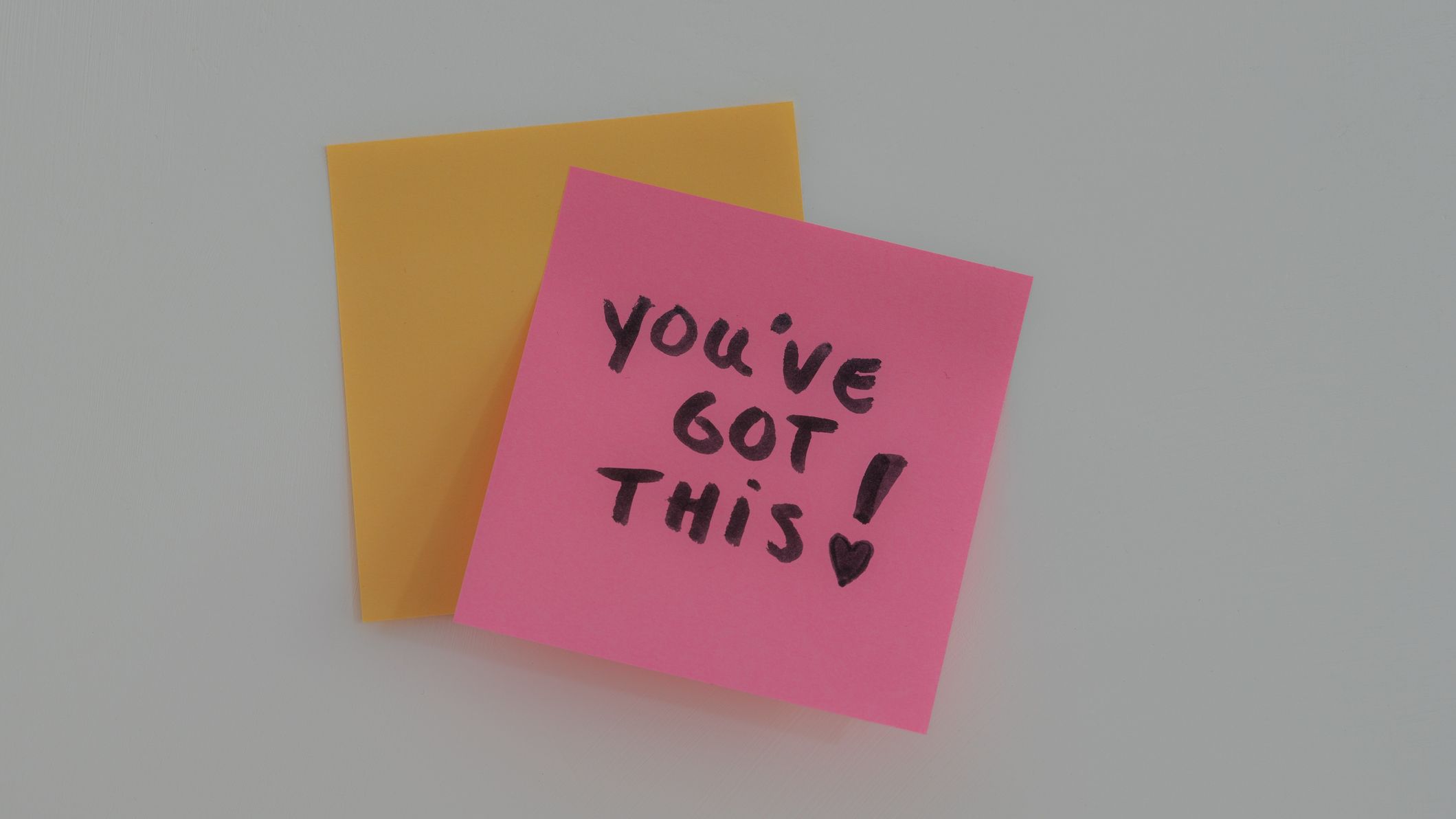 Handwritten &amp;ldquo;You've got this&amp;rdquo; motivational message on a pink sticky note.