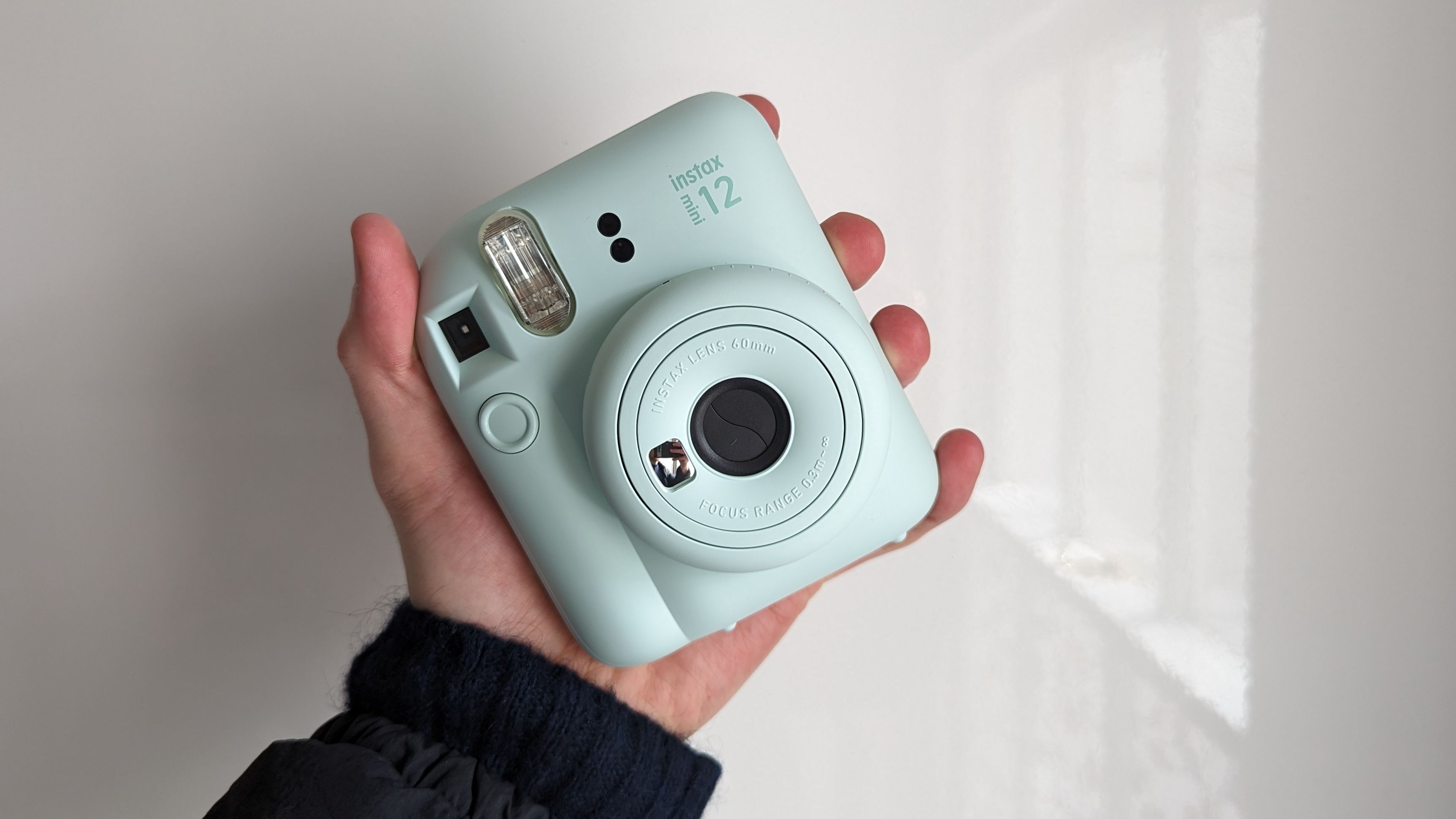 Fujifilm Instax Mini 12 instant camera in green