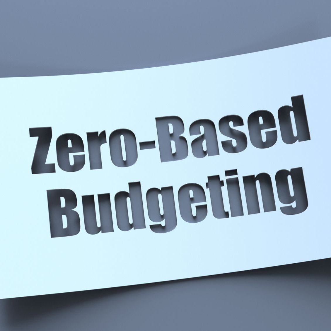 A paper with the words Zero based budgeting cut out
